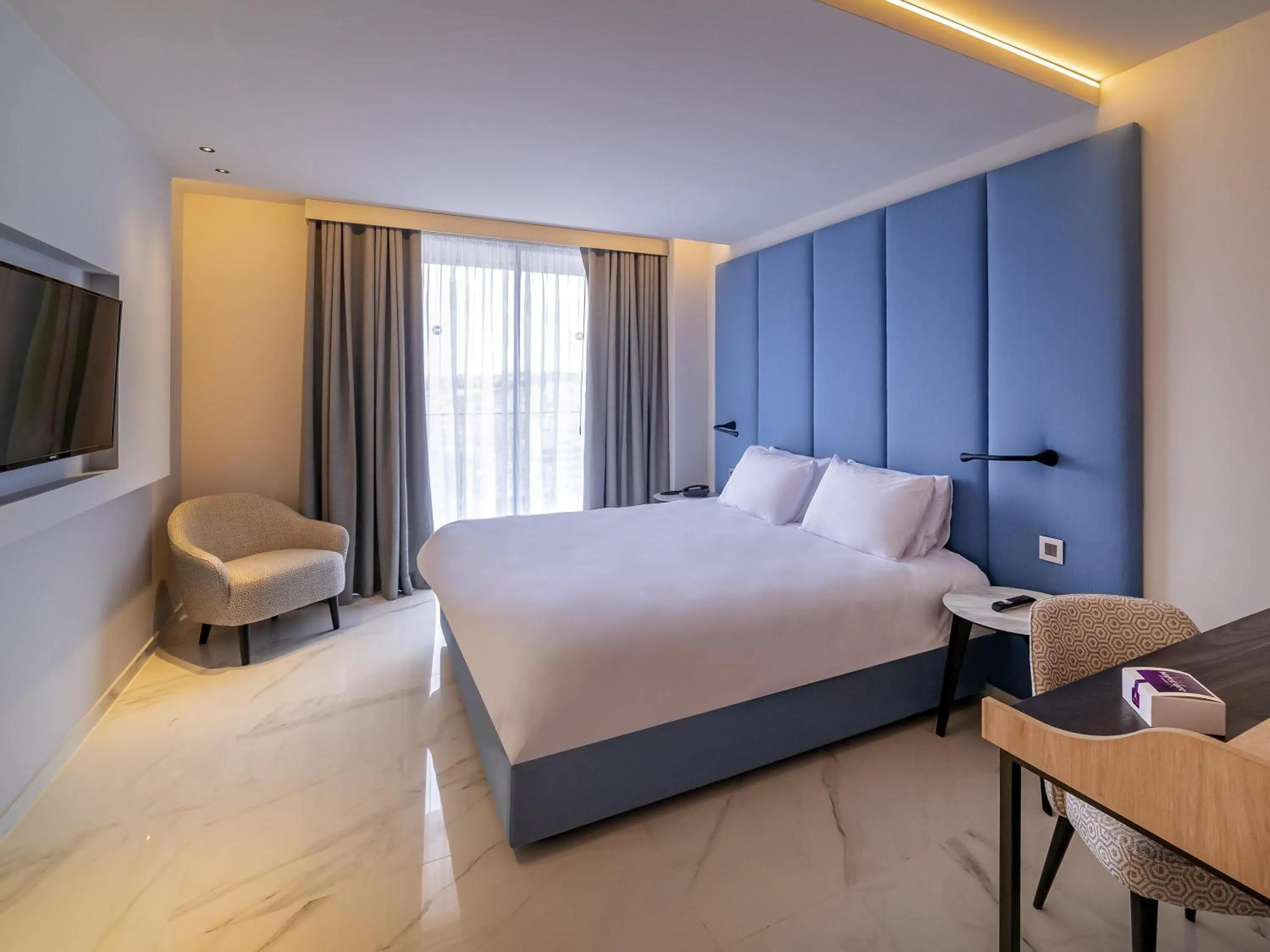 Bedroom, Bed in Mercure St. Julian's Malta