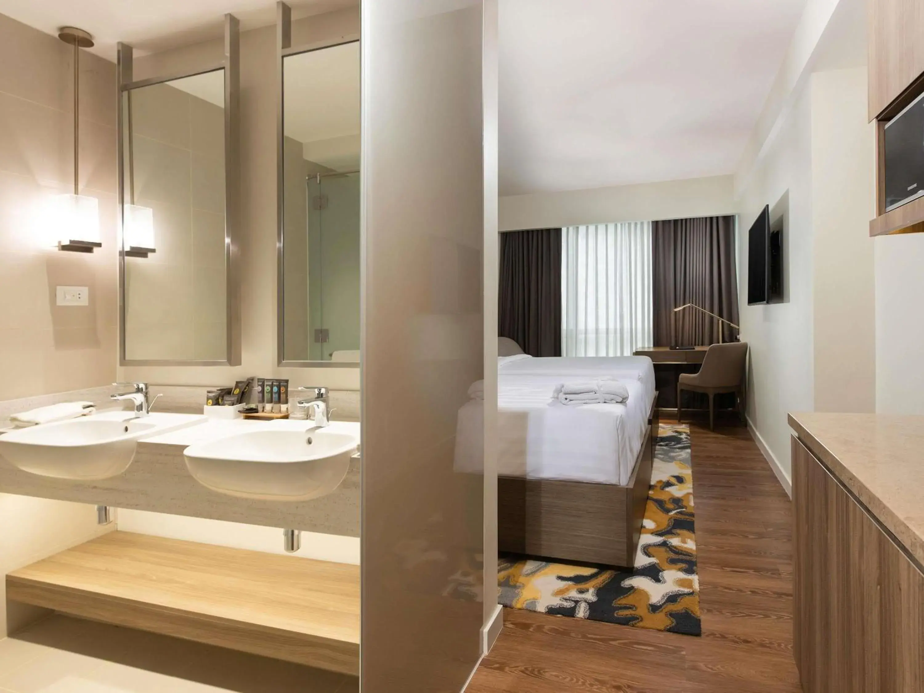 Standard Twin Room in Novotel Suites Manila at Acqua Standard Twin Room in Novotel Suites Manila at Acqua