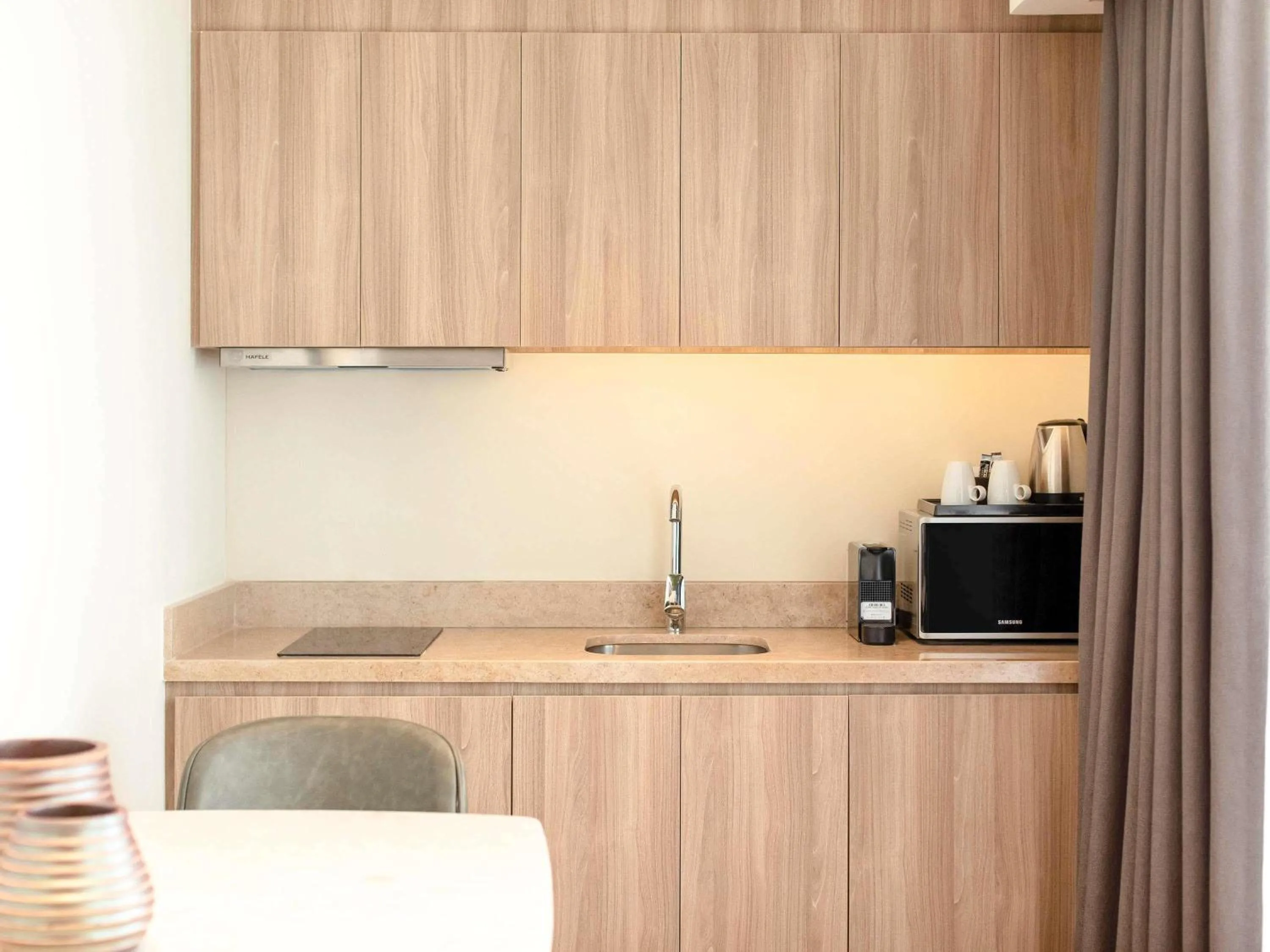 Bedroom in Novotel Suites Manila at Acqua