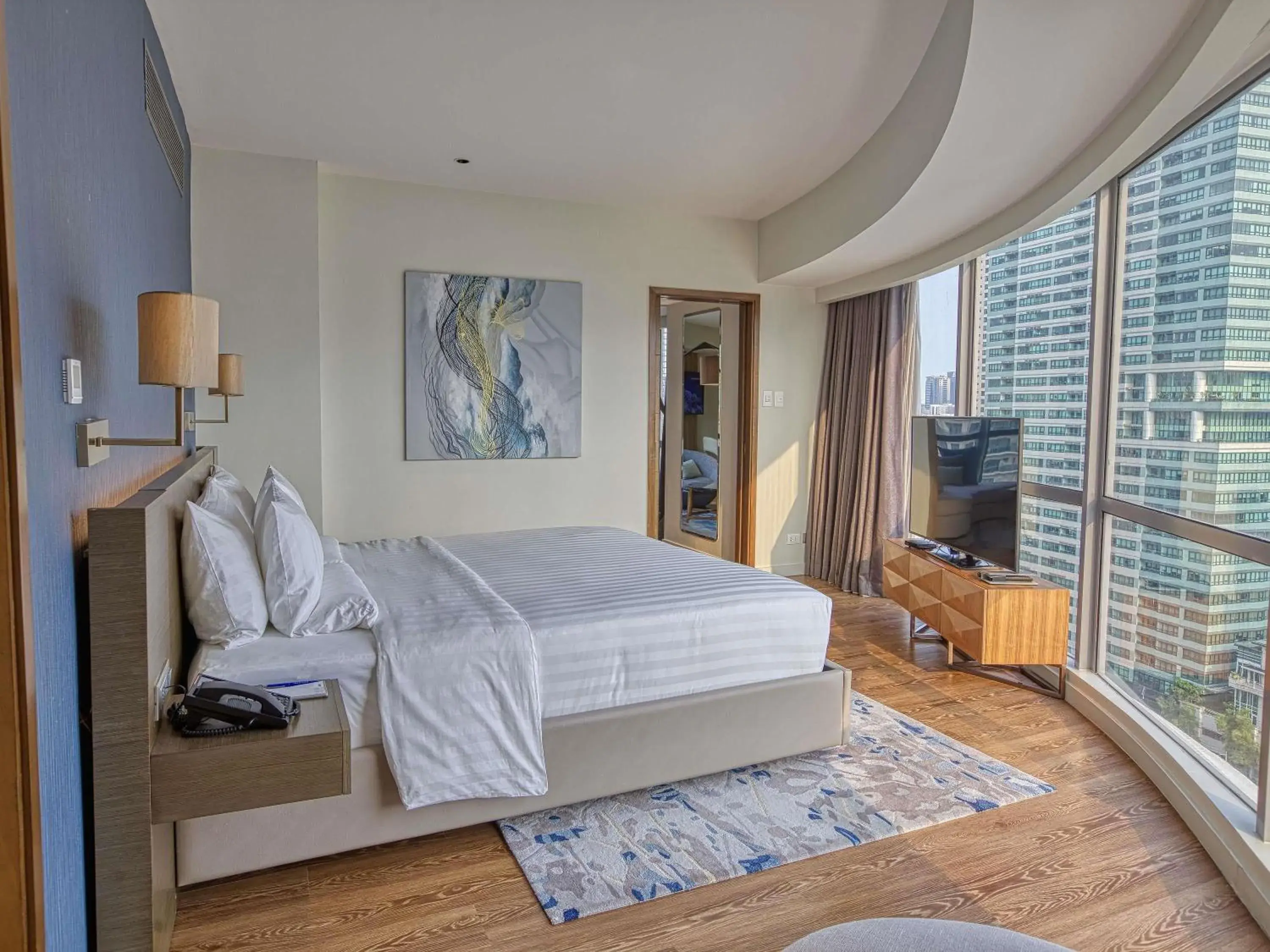 Bedroom, Bed in Novotel Suites Manila at Acqua Bedroom, Bed in Novotel Suites Manila at Acqua