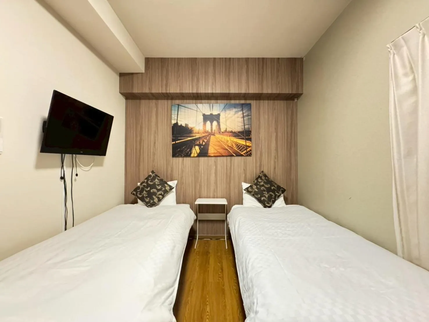 Bed in Sakura Sands Hotel