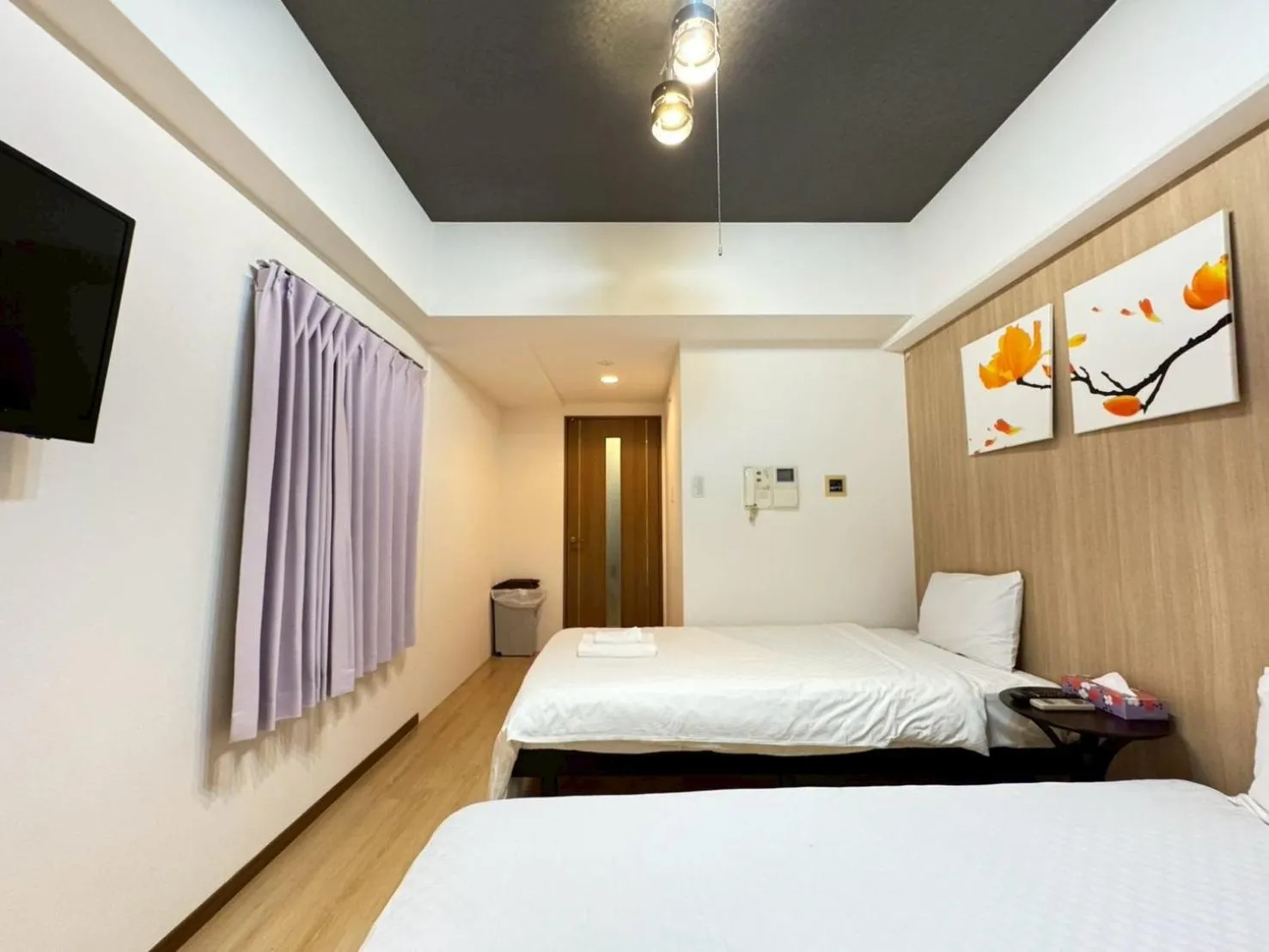 Bed in Sakura Sands Hotel