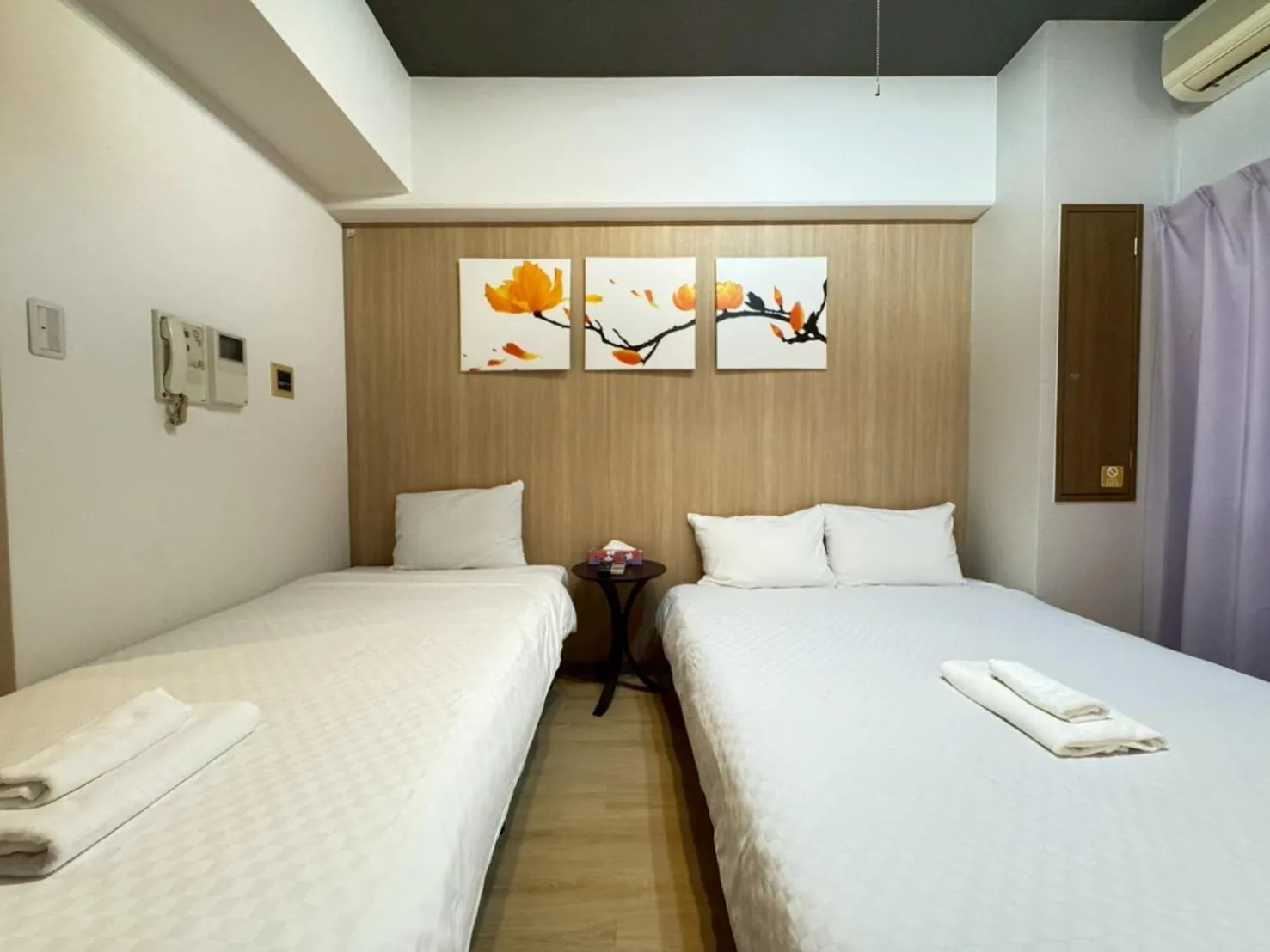 Bed in Sakura Sands Hotel