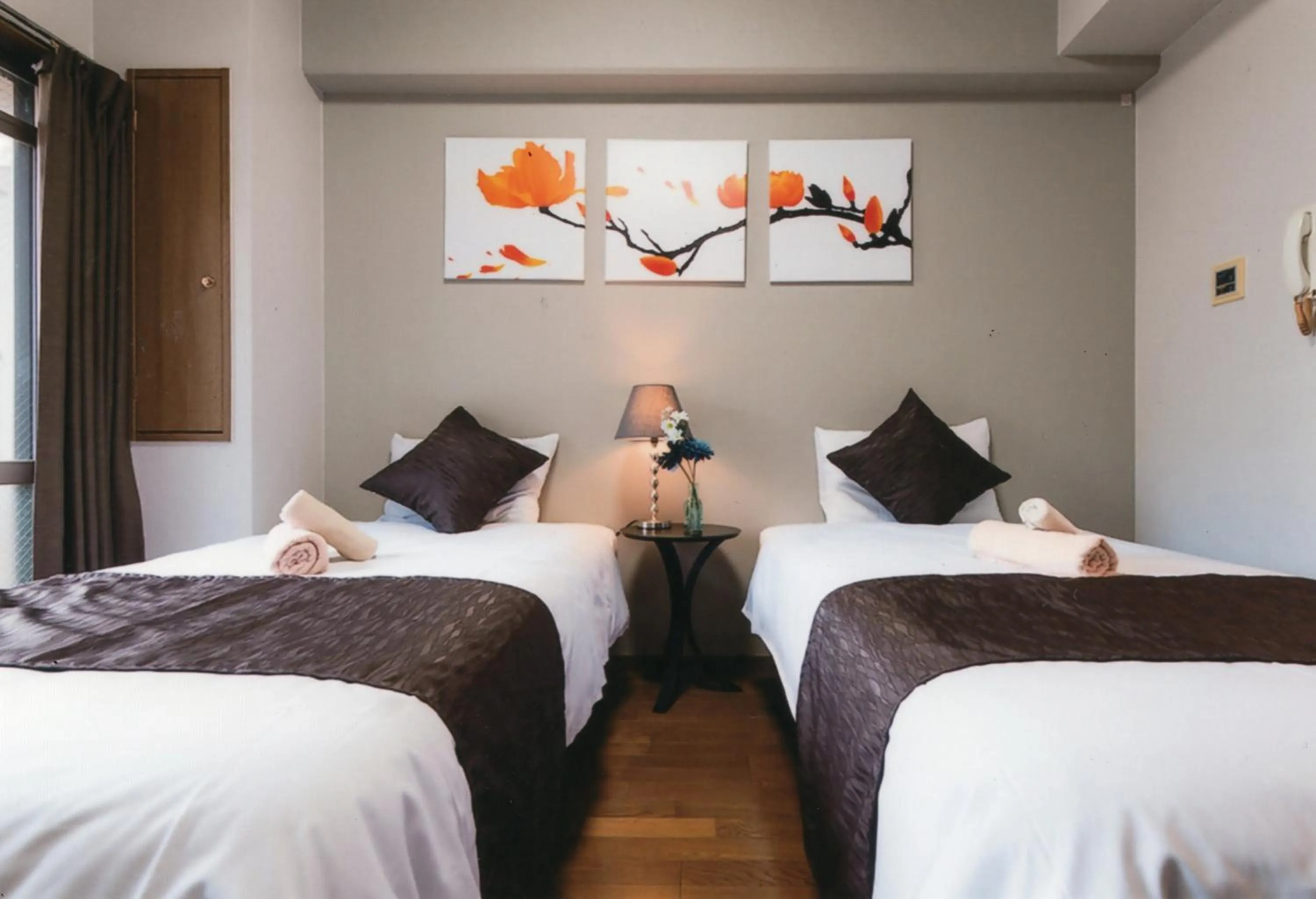 Bed in Sakura Sands Hotel