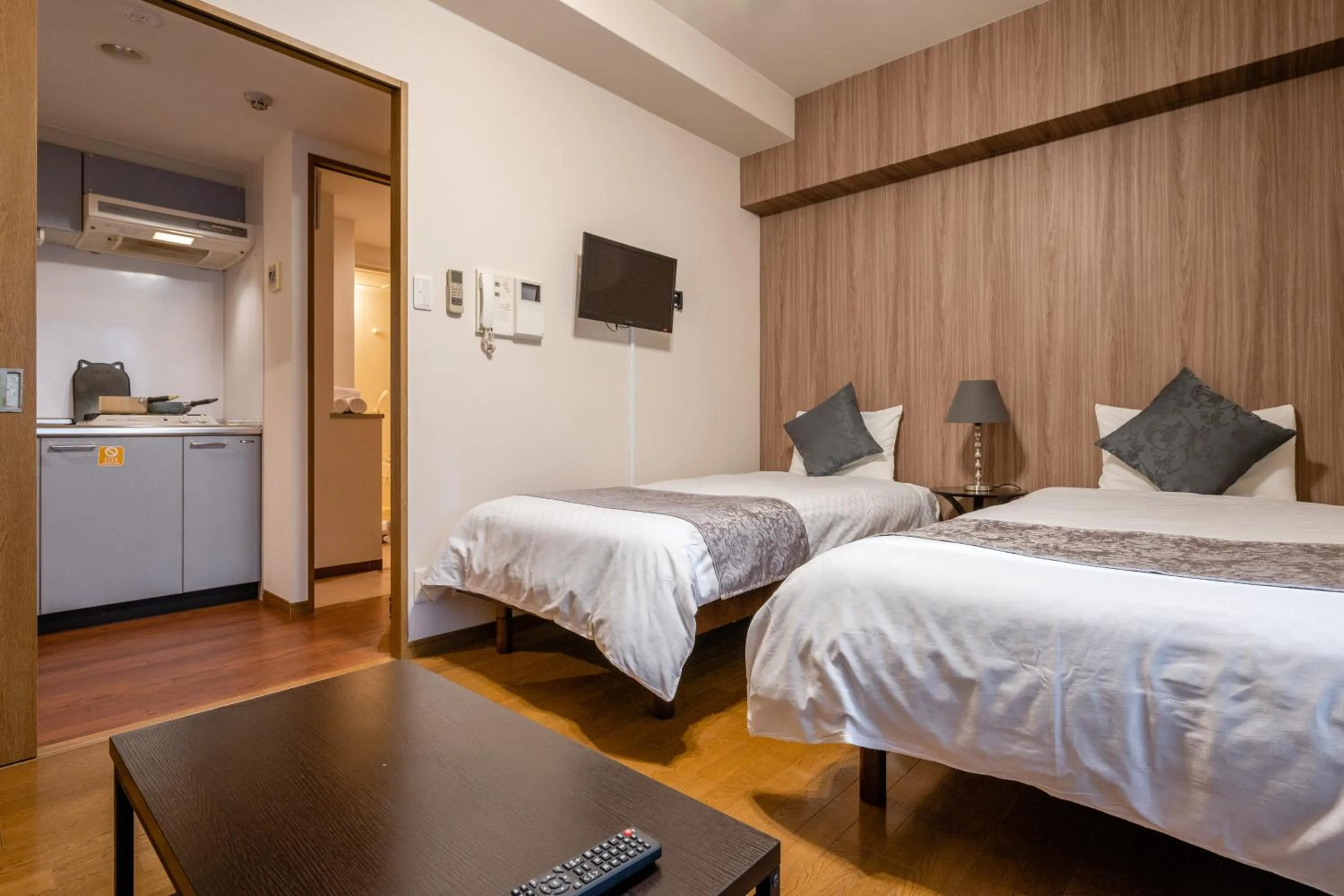 Bedroom, Bed in Sakura Sands Hotel