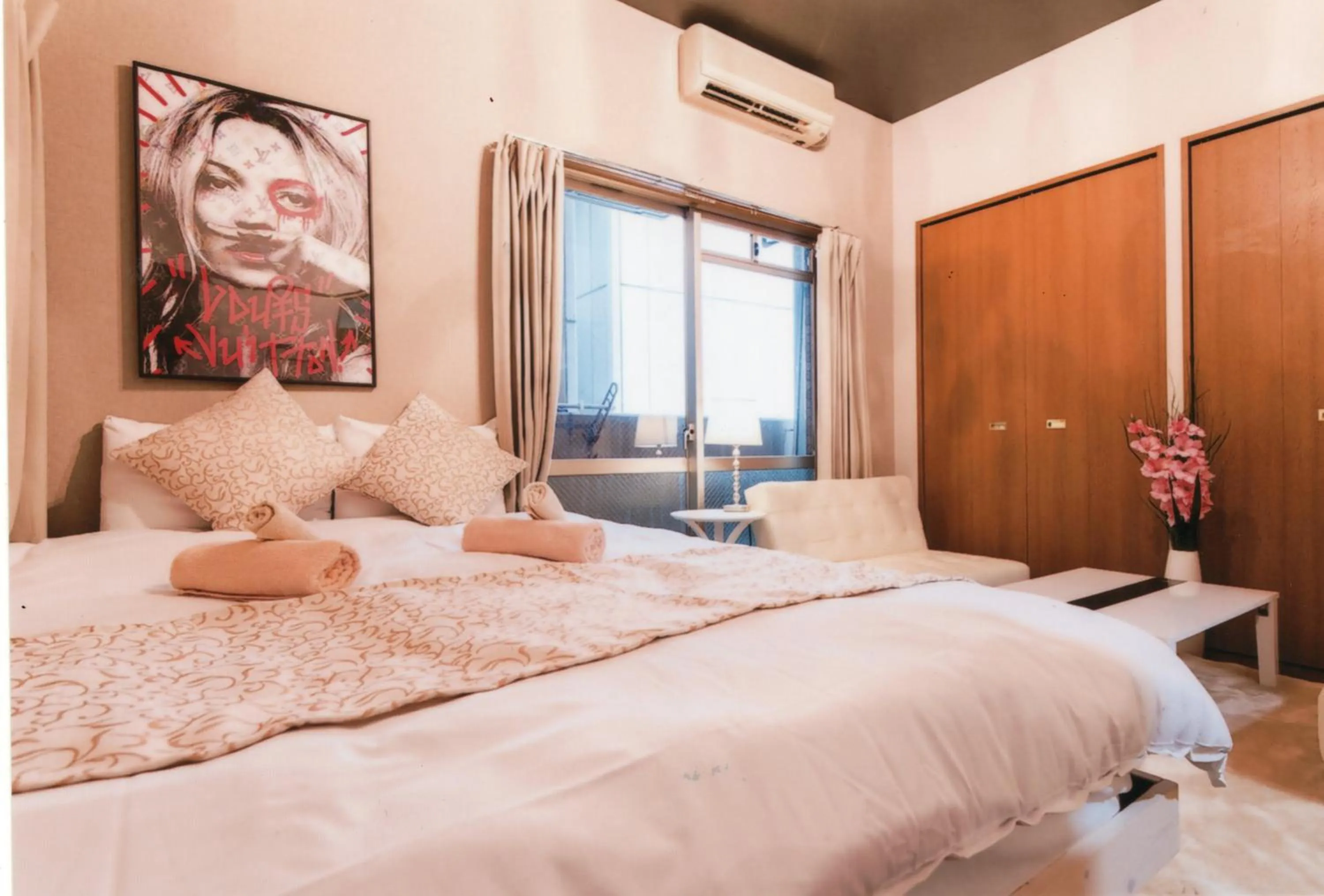 Bed in Sakura Sands Hotel