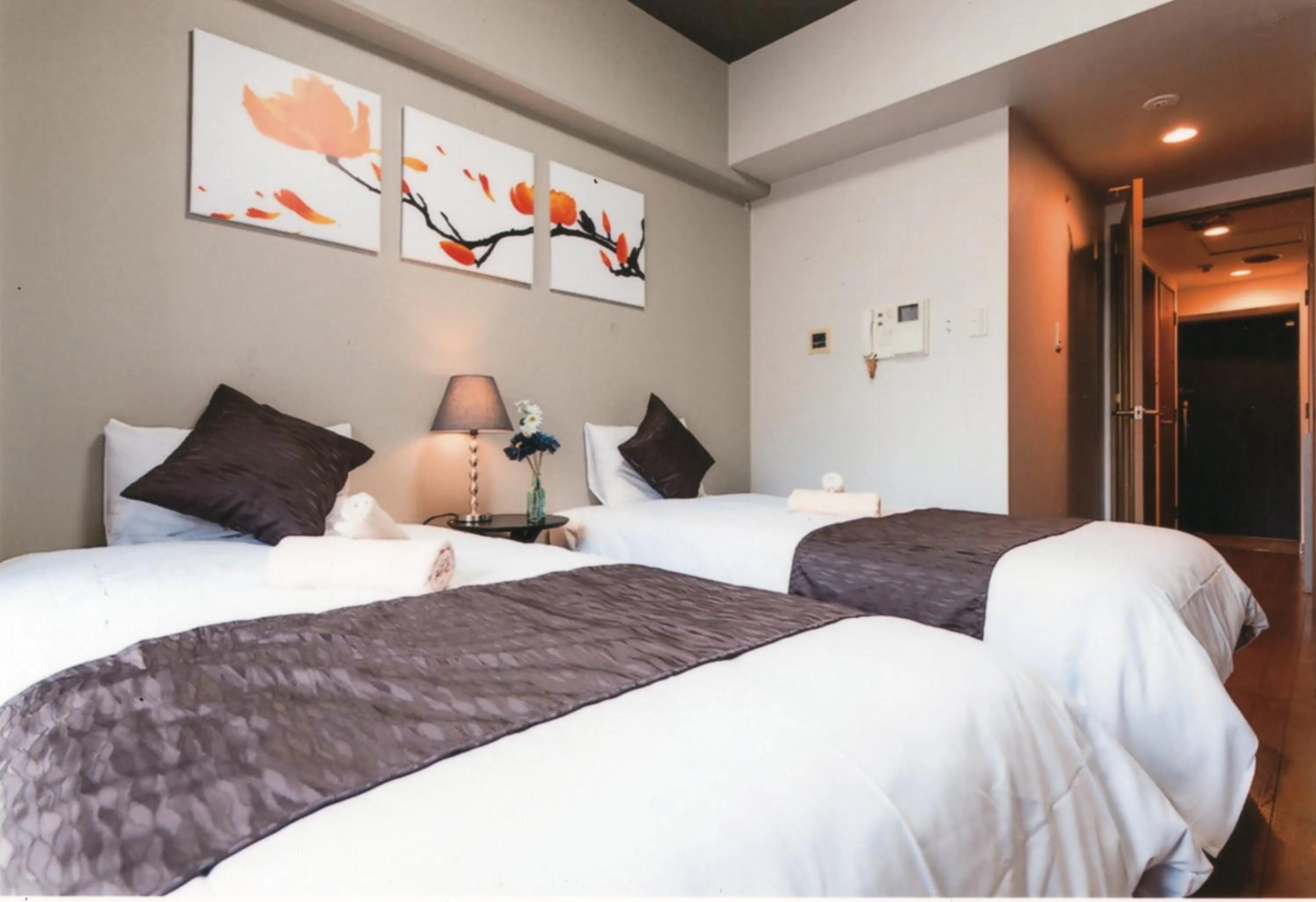 Bed in Sakura Sands Hotel