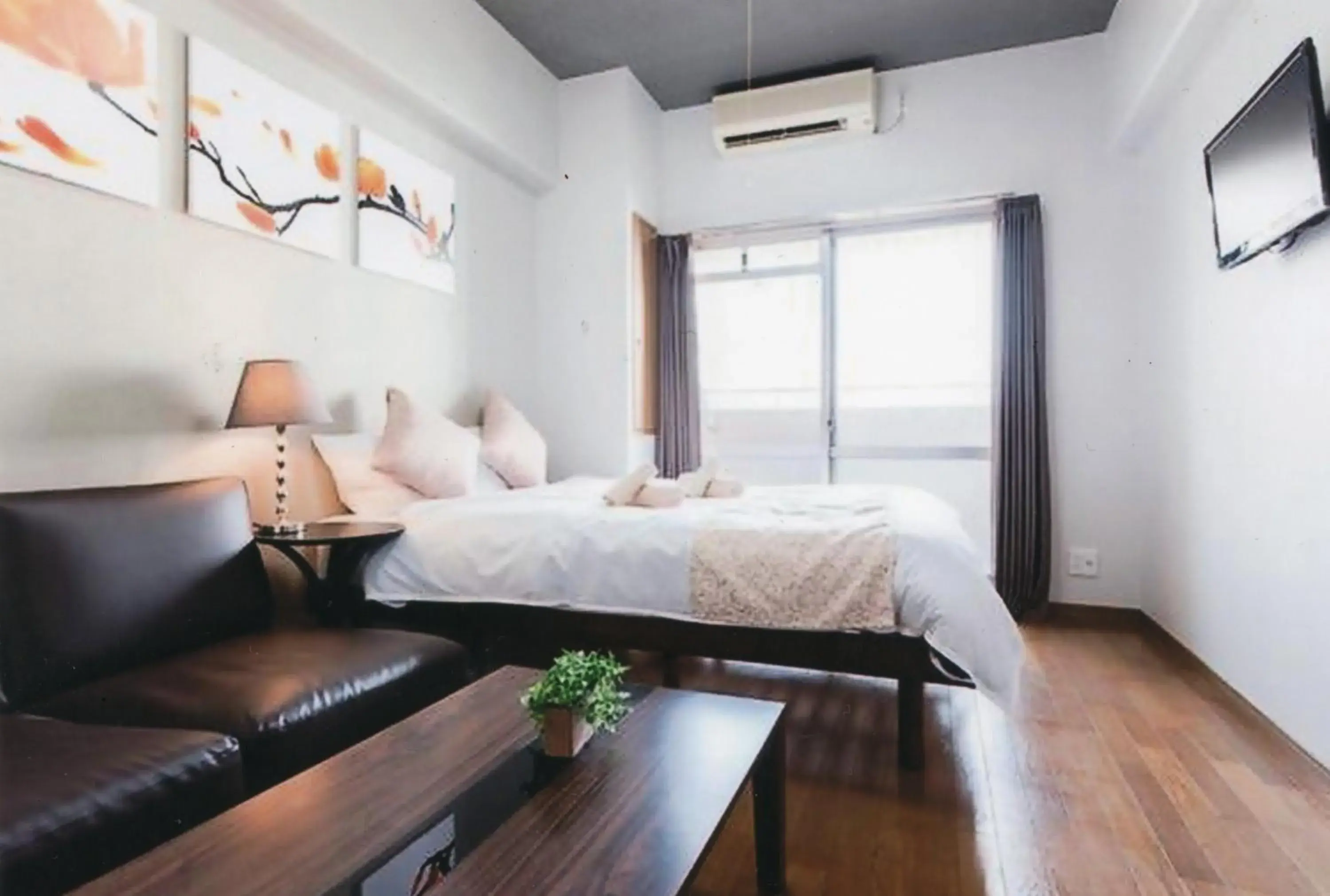 Photo of the whole room, Bed in Sakura Sands Hotel Photo of the whole room, Bed in Sakura Sands Hotel