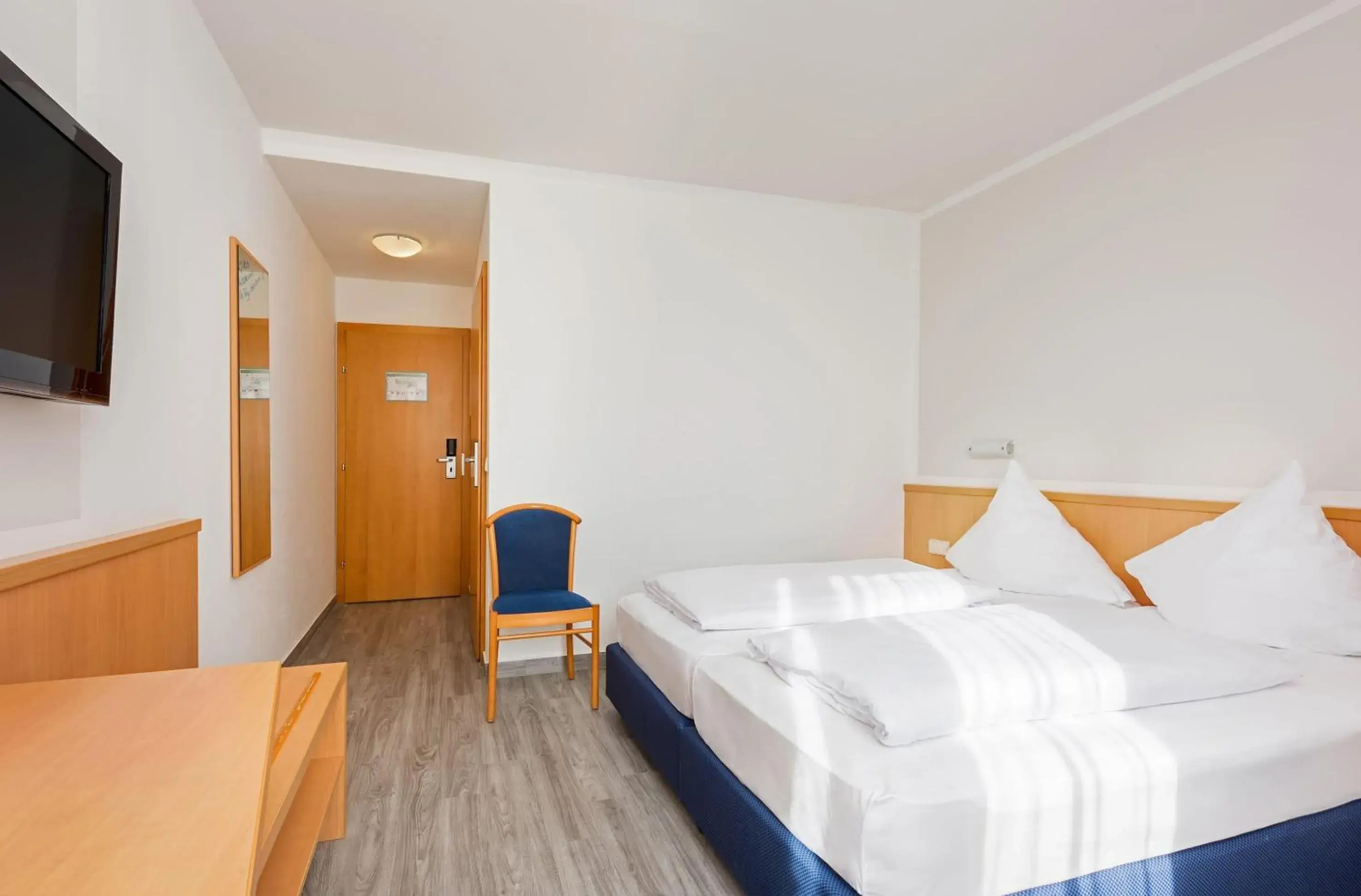 Bedroom, Bed in Hotel Bochum Wattenscheid affiliated by Meliá Bedroom, Bed in Hotel Bochum Wattenscheid affiliated by Meliá