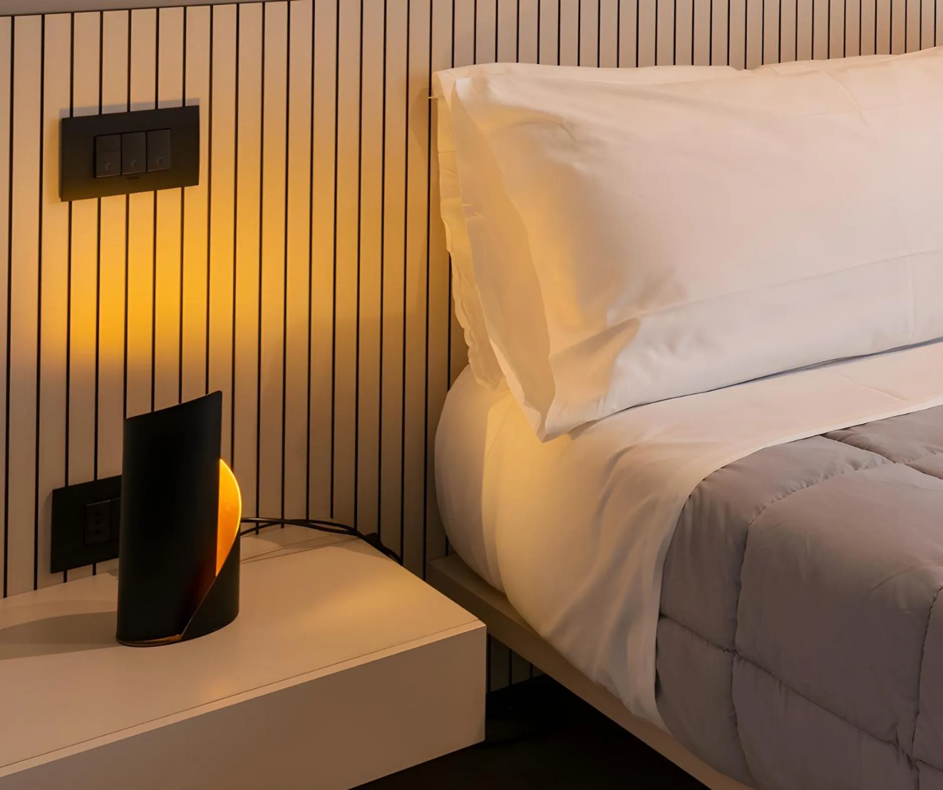 Bed in Amare Suite & Apartments