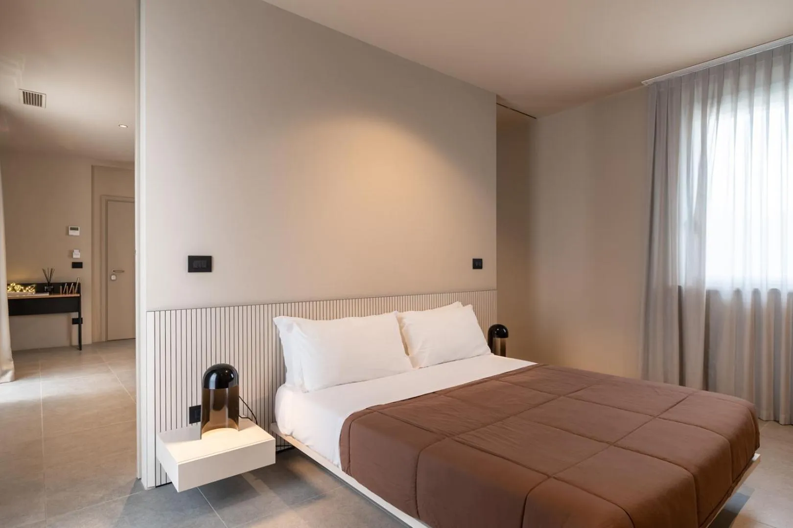 Bed in Amare Suite & Apartments