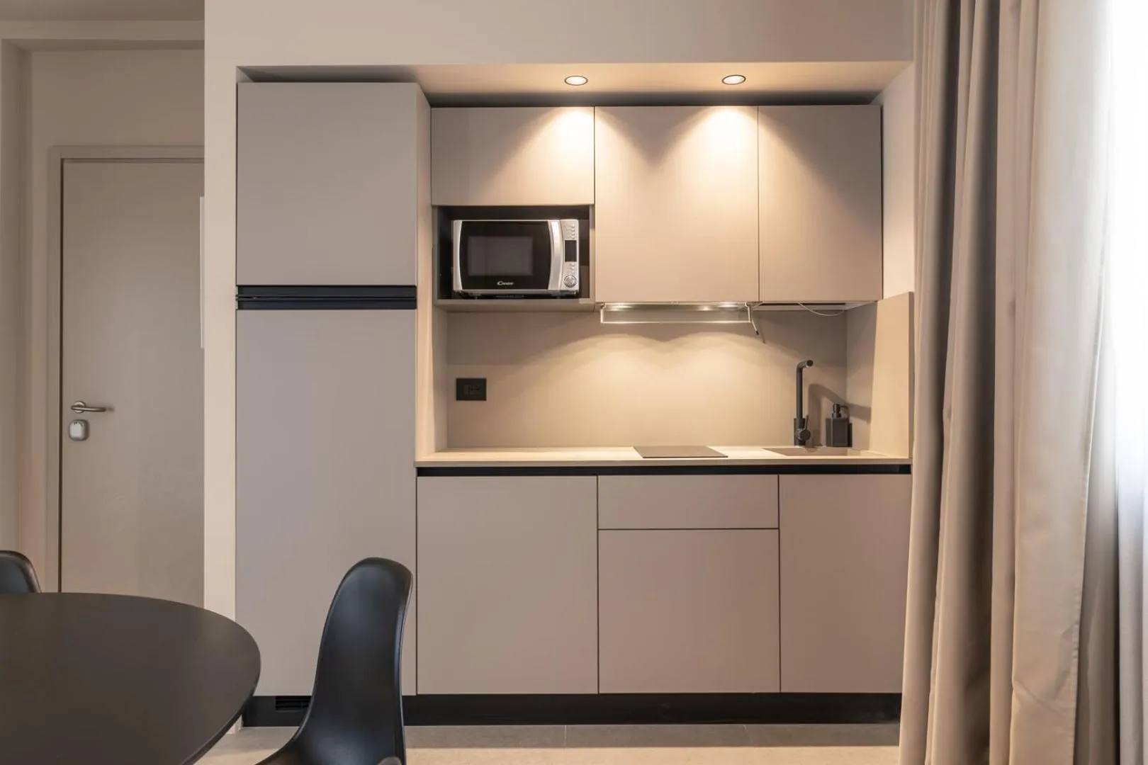 Kitchen or kitchenette in Amare Suite & Apartments