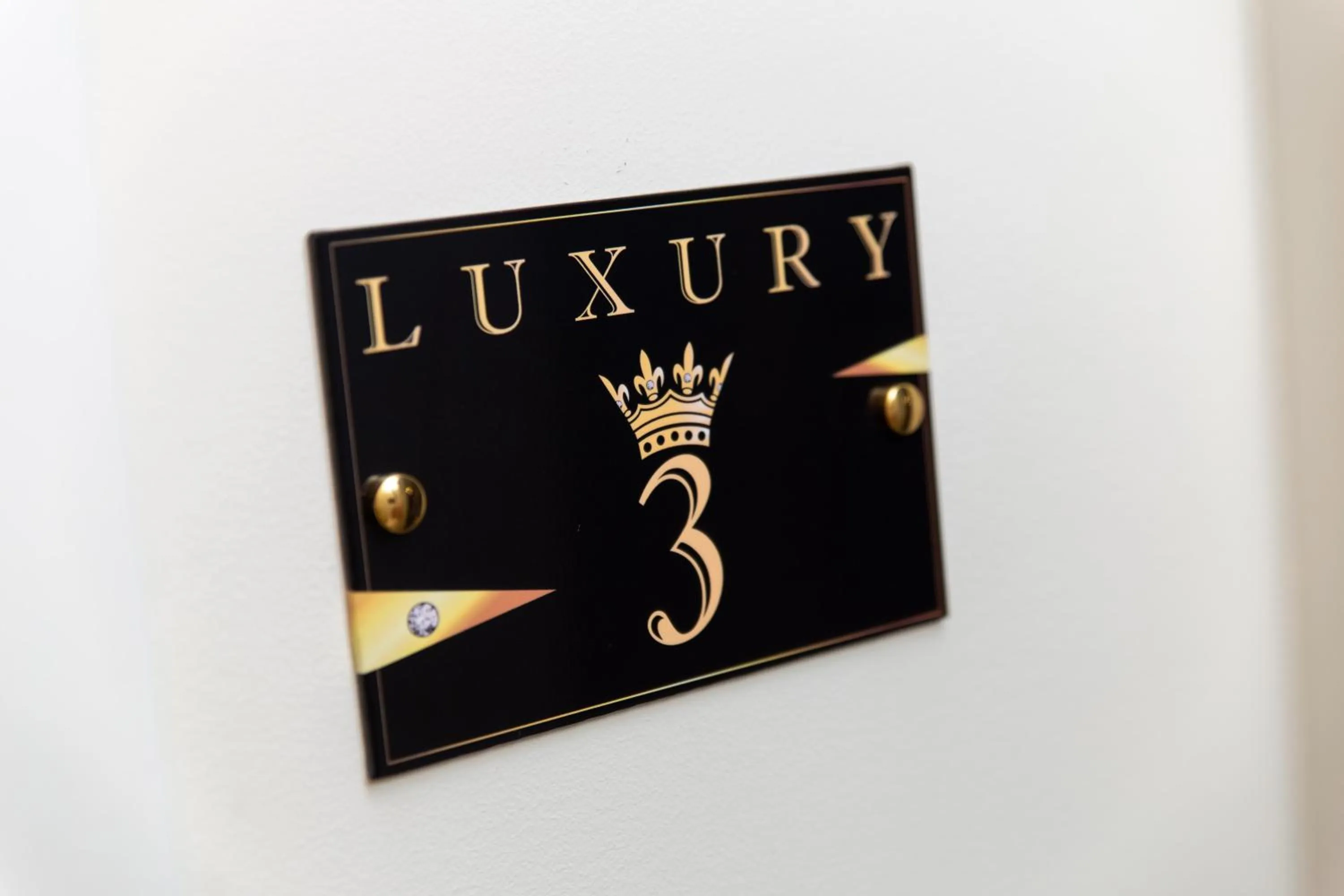 Property logo or sign in Luxury Number 1 Apartments