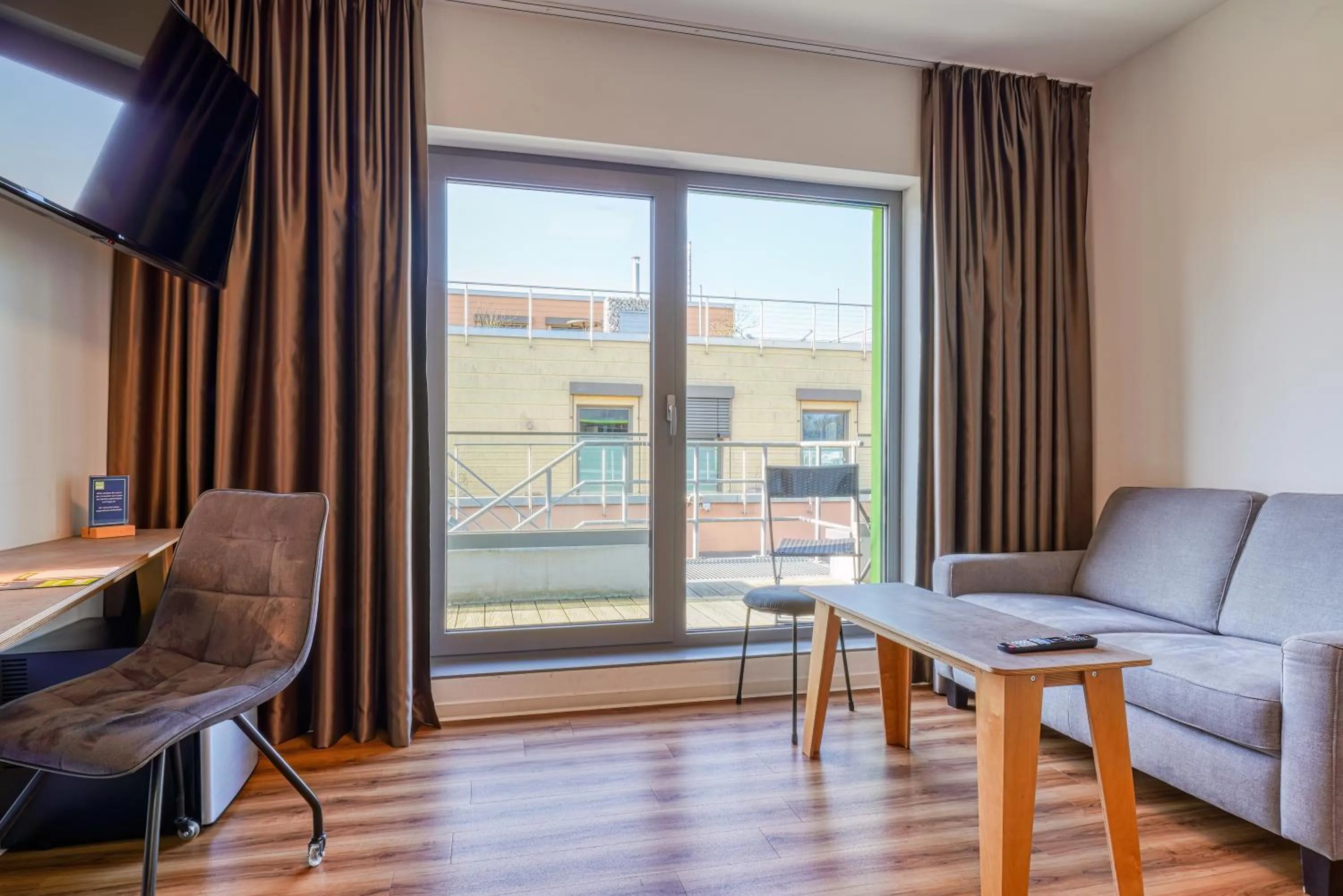 TV and multimedia in NiceToStay by Fairway Hotels