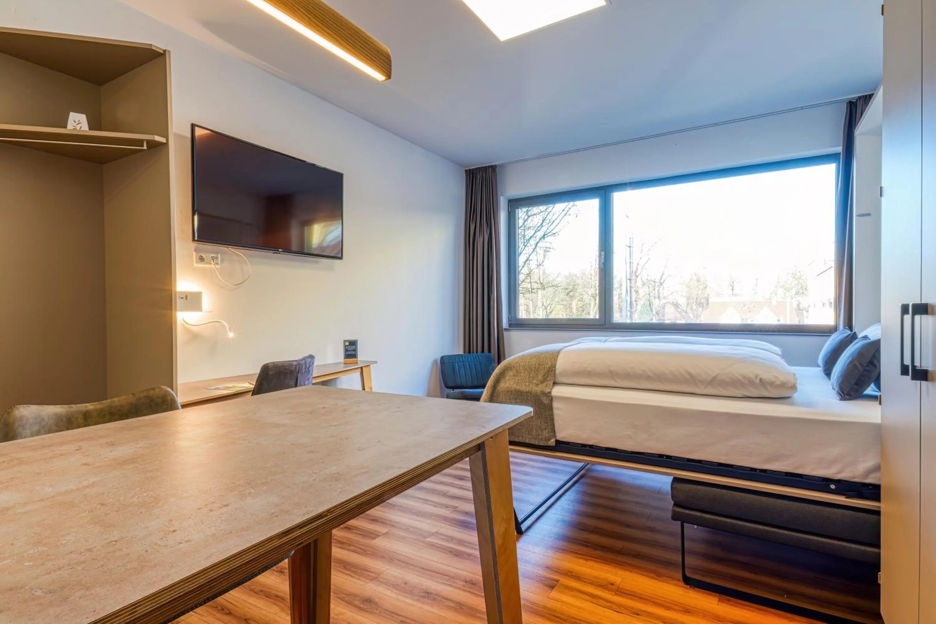 Bed in NiceToStay by Fairway Hotels