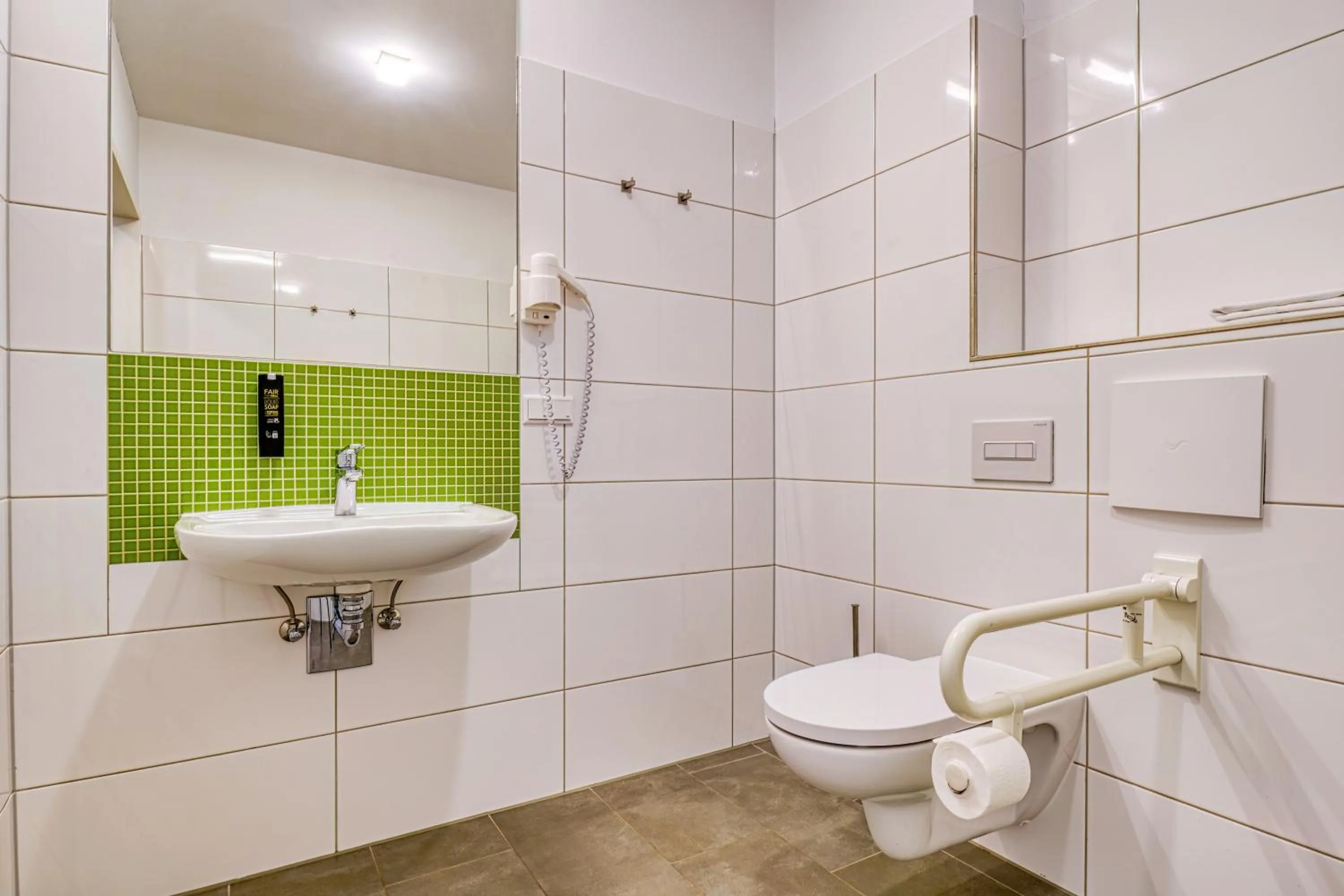 Shower in NiceToStay by Fairway Hotels
