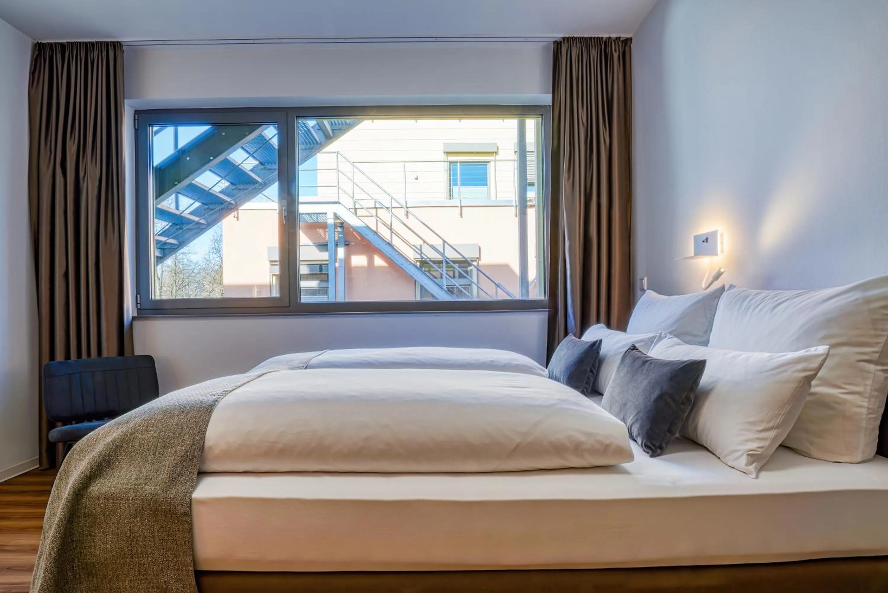 Bed in NiceToStay by Fairway Hotels