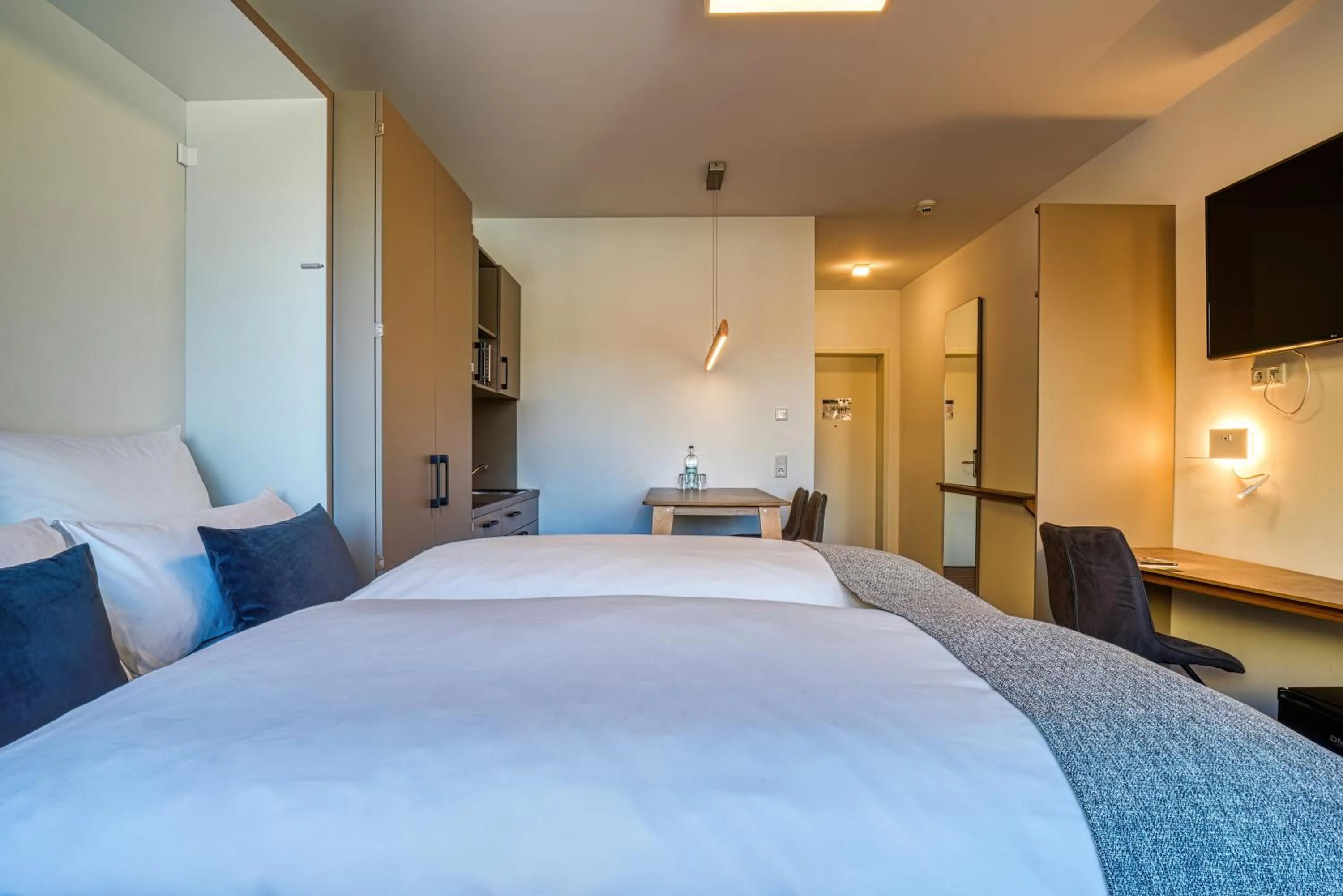 Bed in NiceToStay by Fairway Hotels