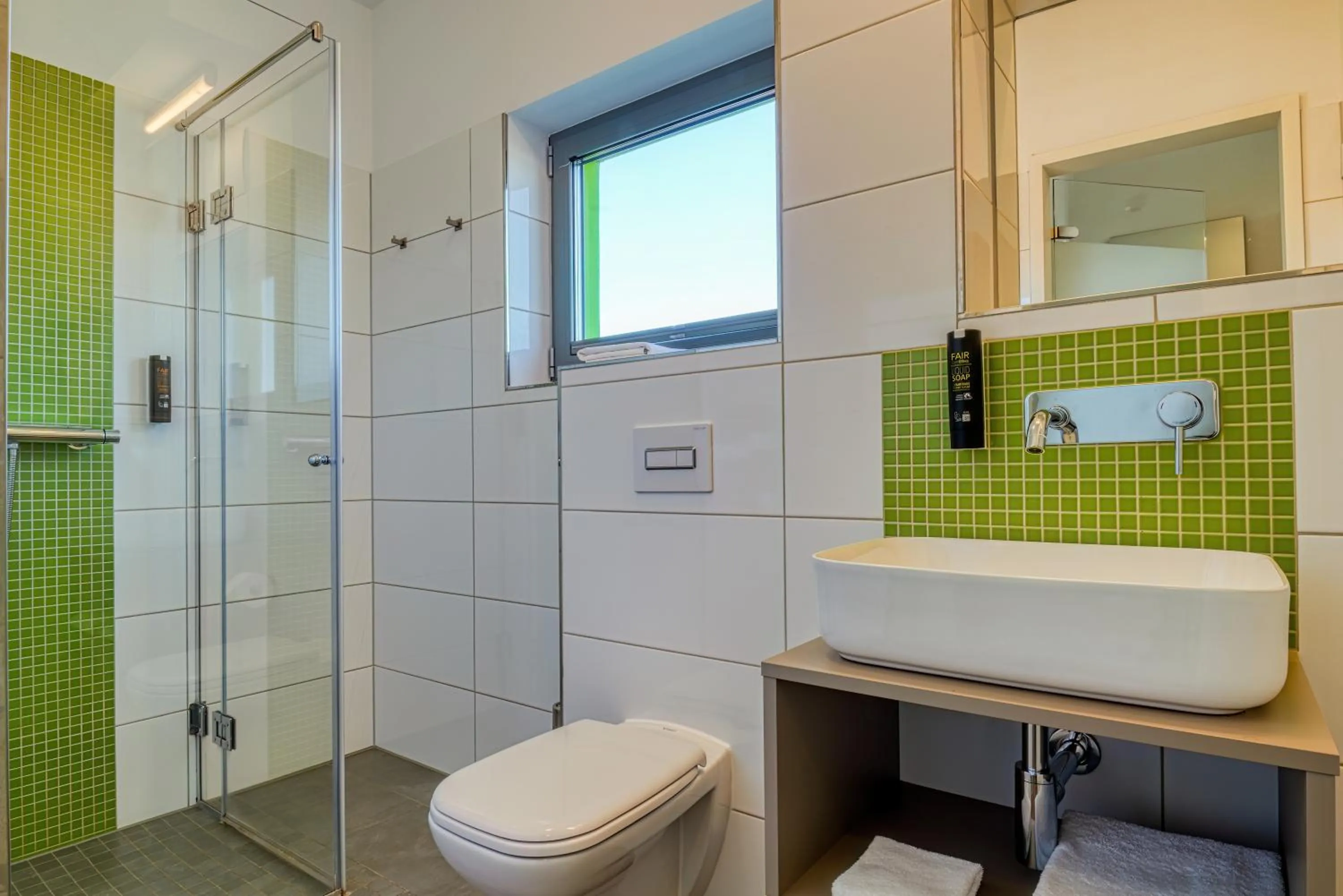 Shower in NiceToStay by Fairway Hotels