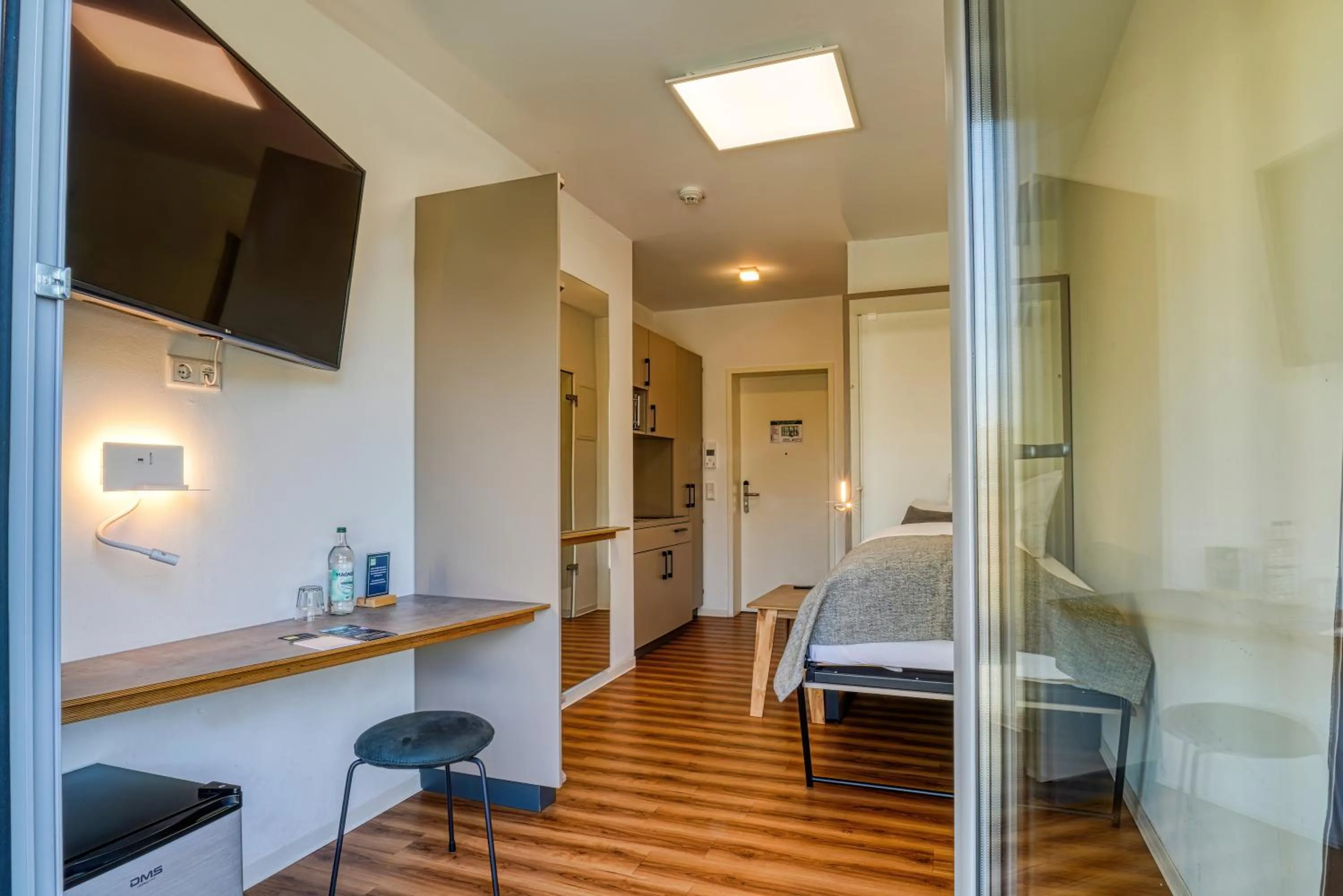 Bed in NiceToStay by Fairway Hotels