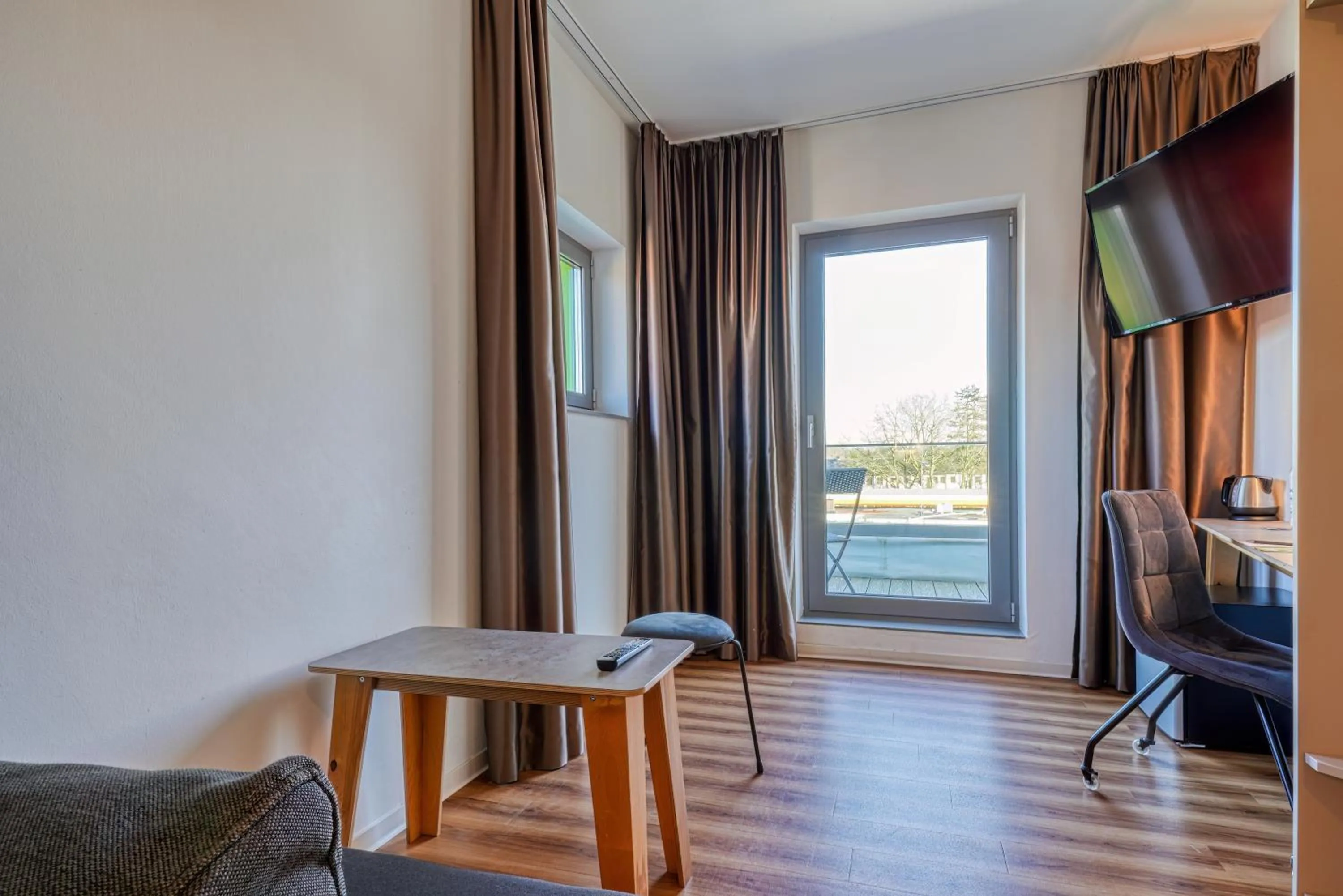 TV and multimedia in NiceToStay by Fairway Hotels