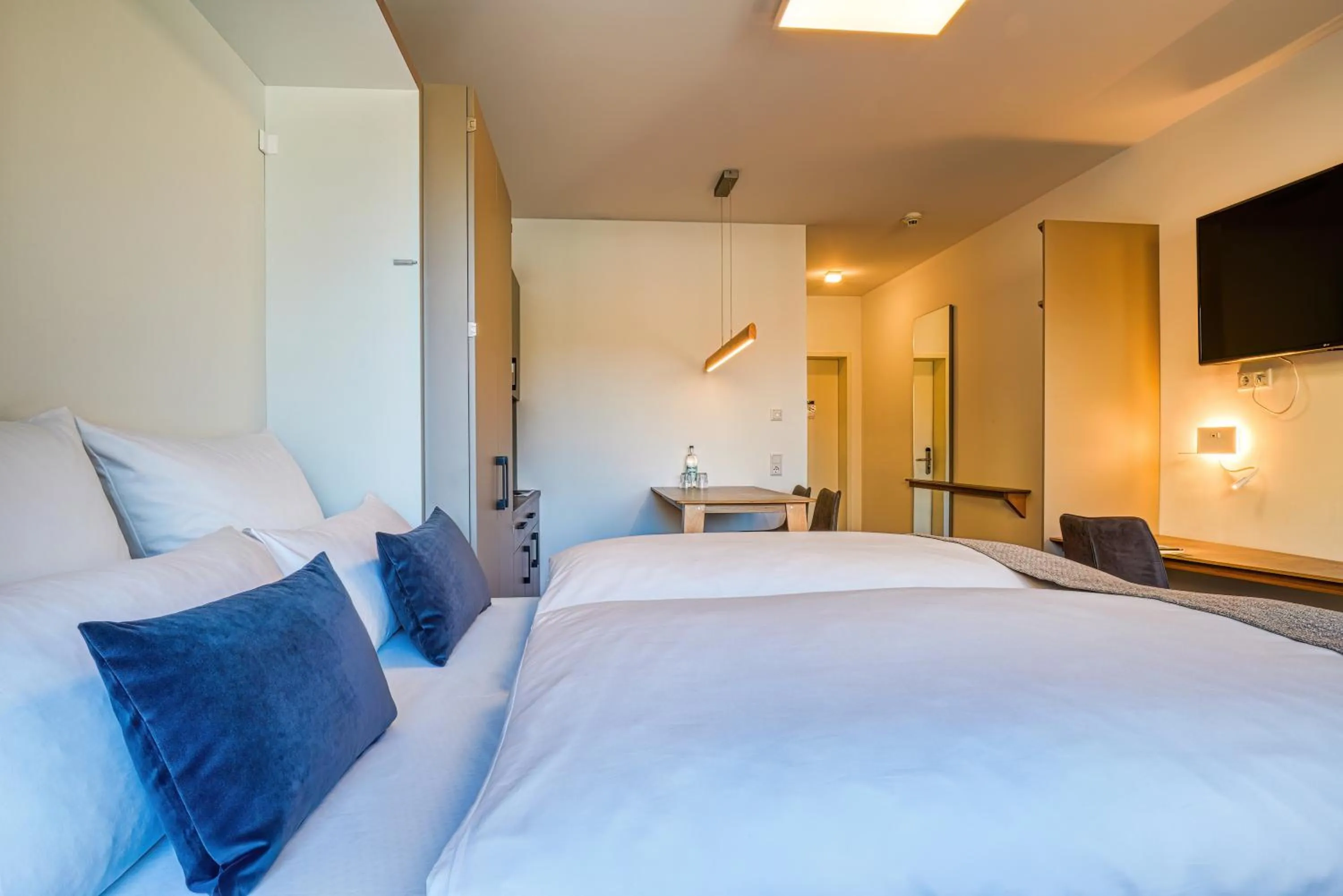 Bed in NiceToStay by Fairway Hotels