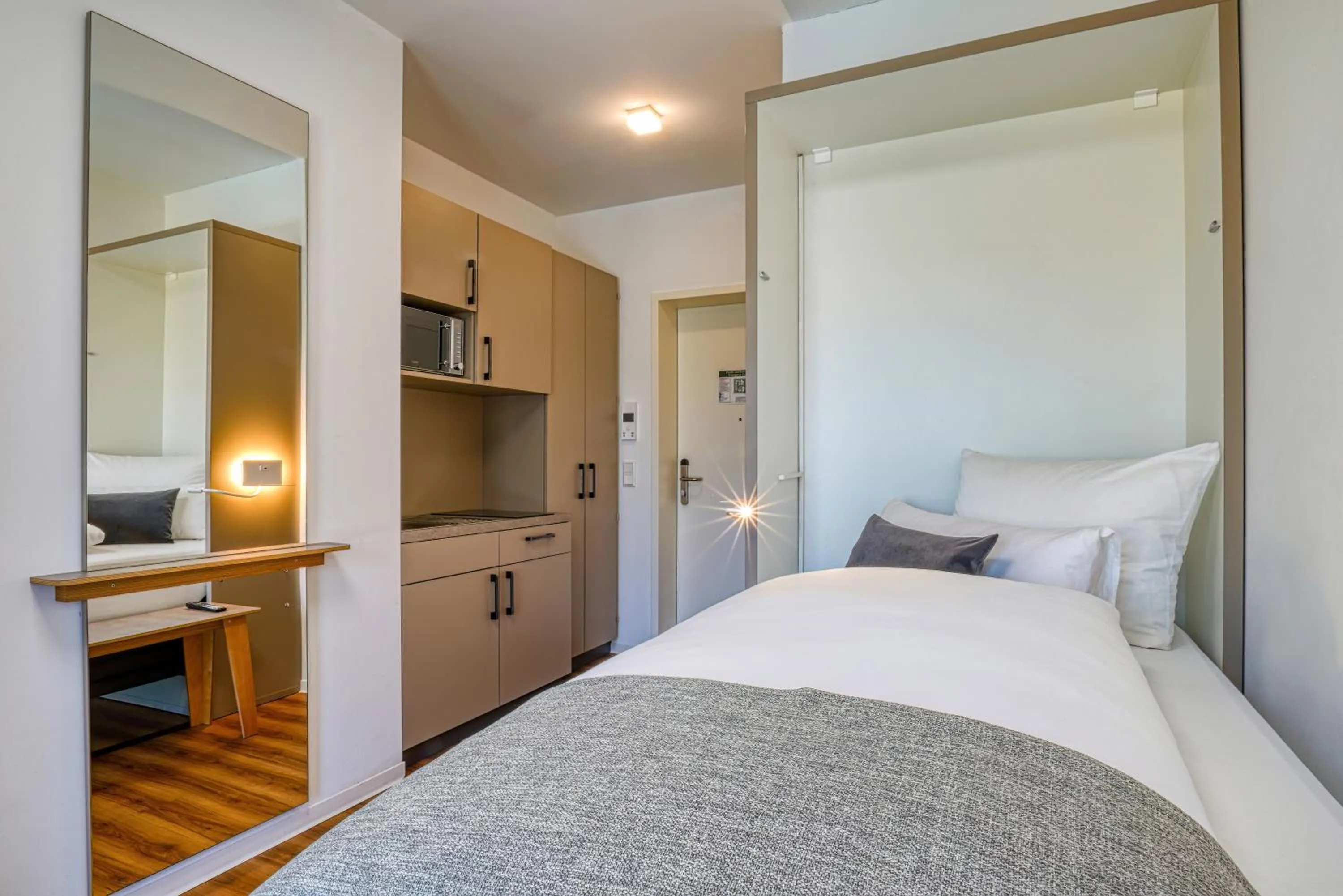 Bed in NiceToStay by Fairway Hotels