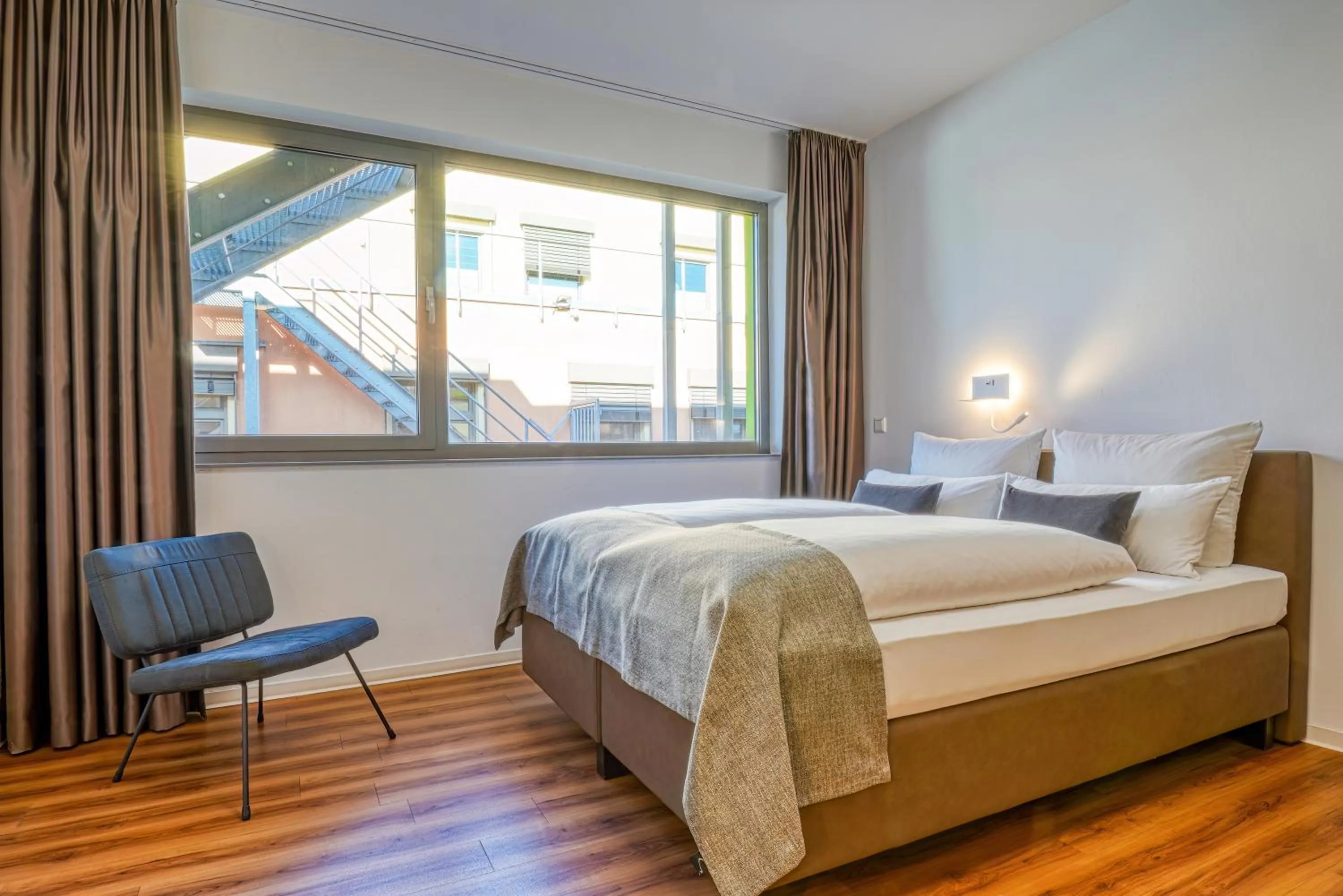 Bed in NiceToStay by Fairway Hotels