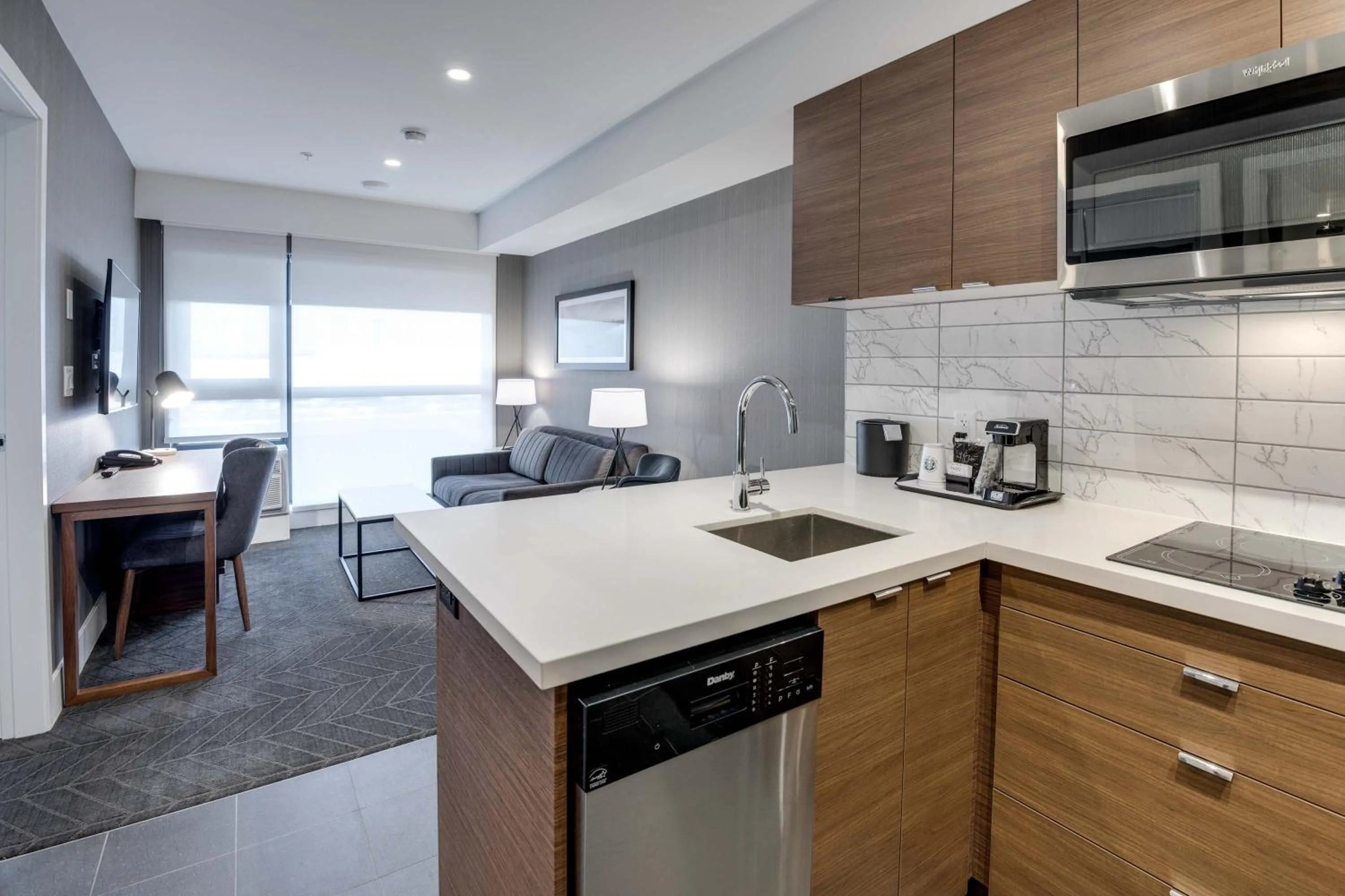 Kitchen or kitchenette in Sandman Signature Saskatoon South Hotel