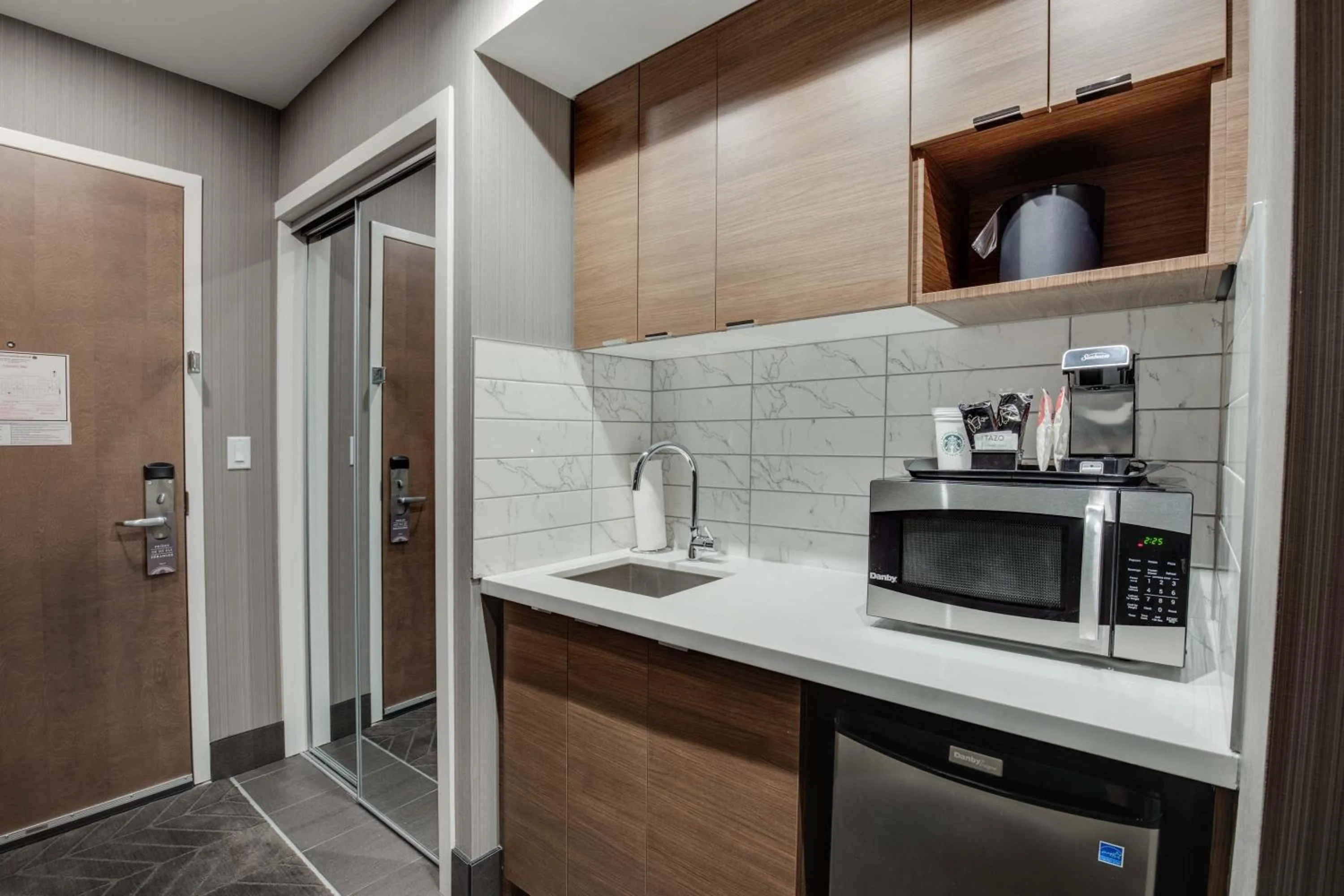 Kitchen or kitchenette in Sandman Signature Saskatoon South Hotel