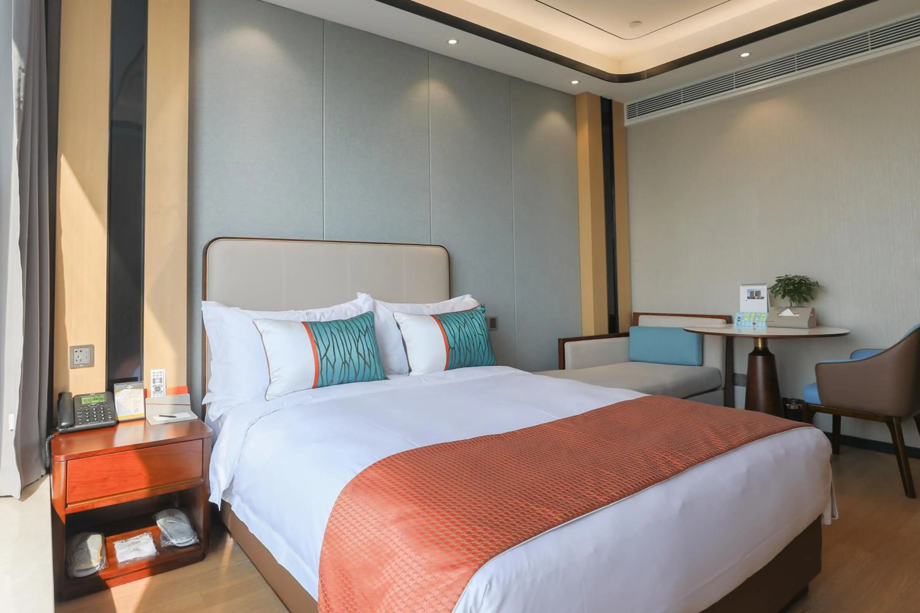 Bed in Jinling Funhome Hotel Nanjing Jiulong Lake - Nanjing South Railway Station