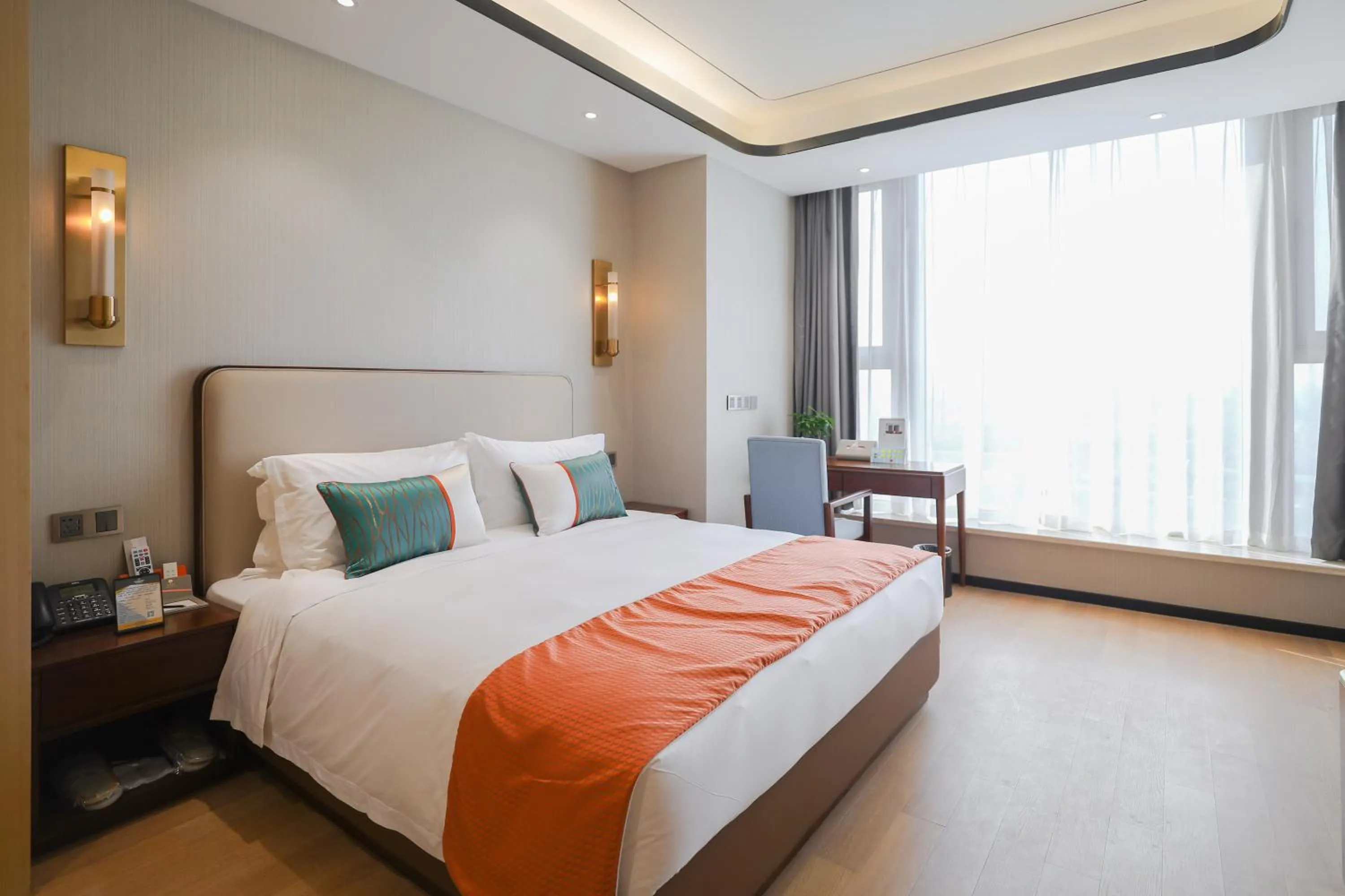 Bed in Jinling Funhome Hotel Nanjing Jiulong Lake - Nanjing South Railway Station