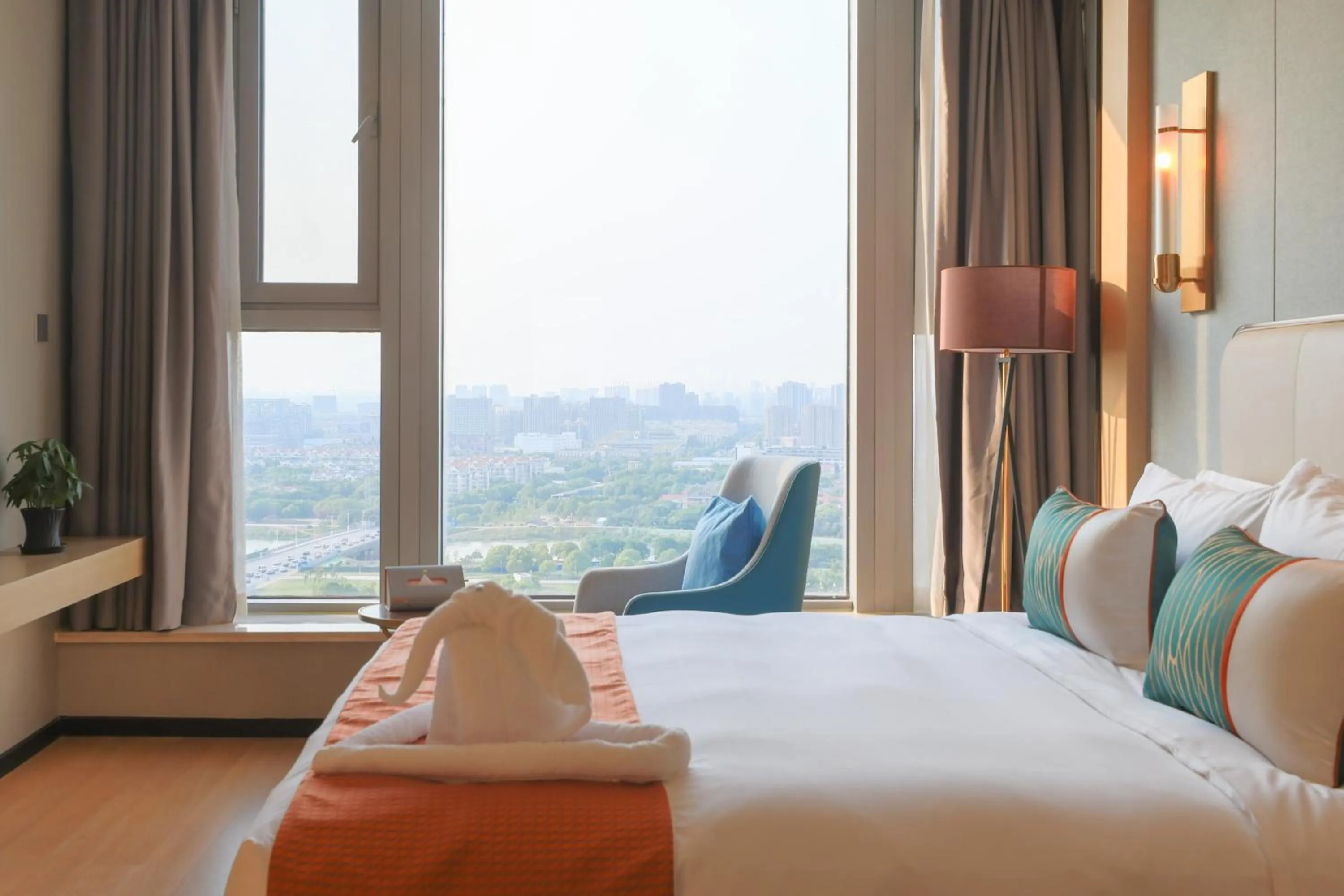 Bed in Jinling Funhome Hotel Nanjing Jiulong Lake - Nanjing South Railway Station