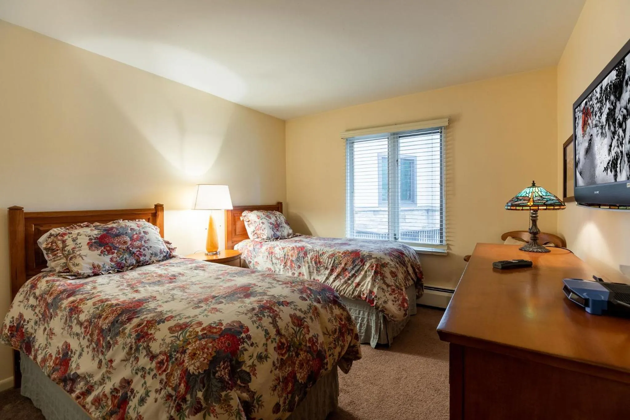 Bed in All Seasons by Vail Realty