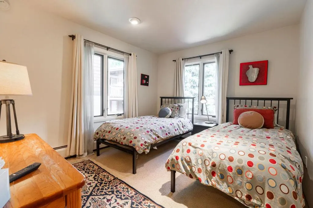 Bed in All Seasons by Vail Realty