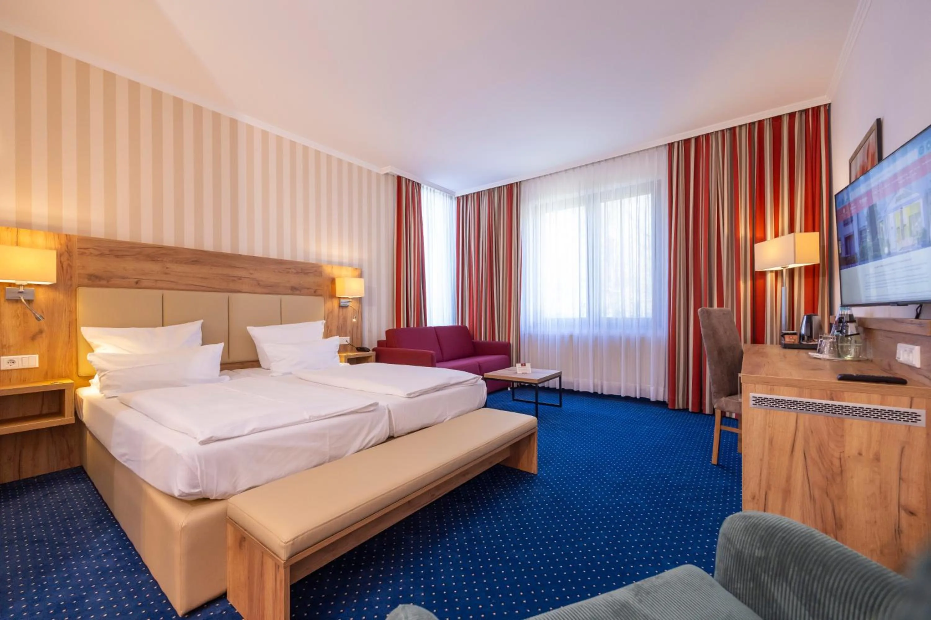 Photo of the whole room, Bed in Parkhotel Hohenfeld Münster