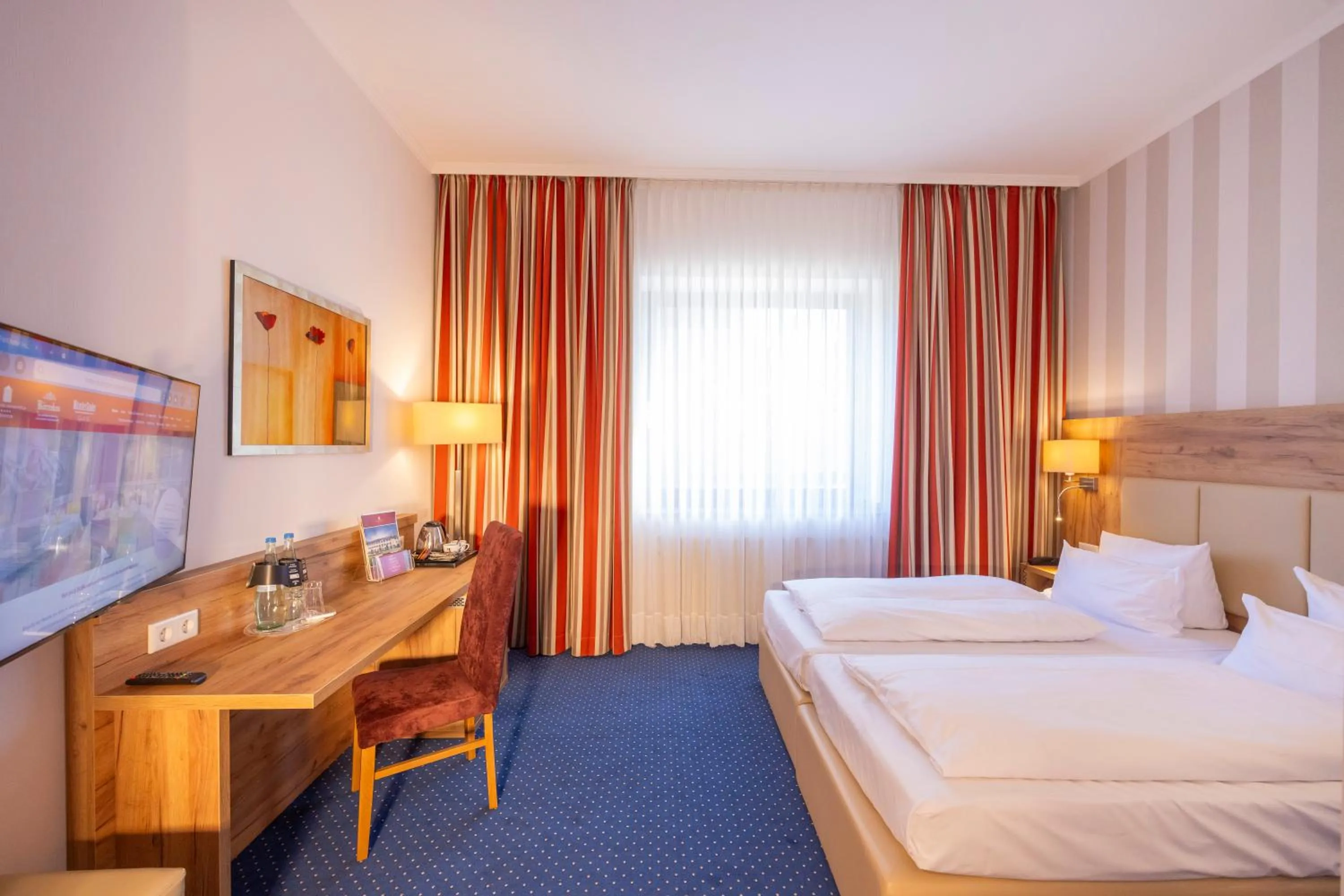 Photo of the whole room, Bed in Parkhotel Hohenfeld Münster