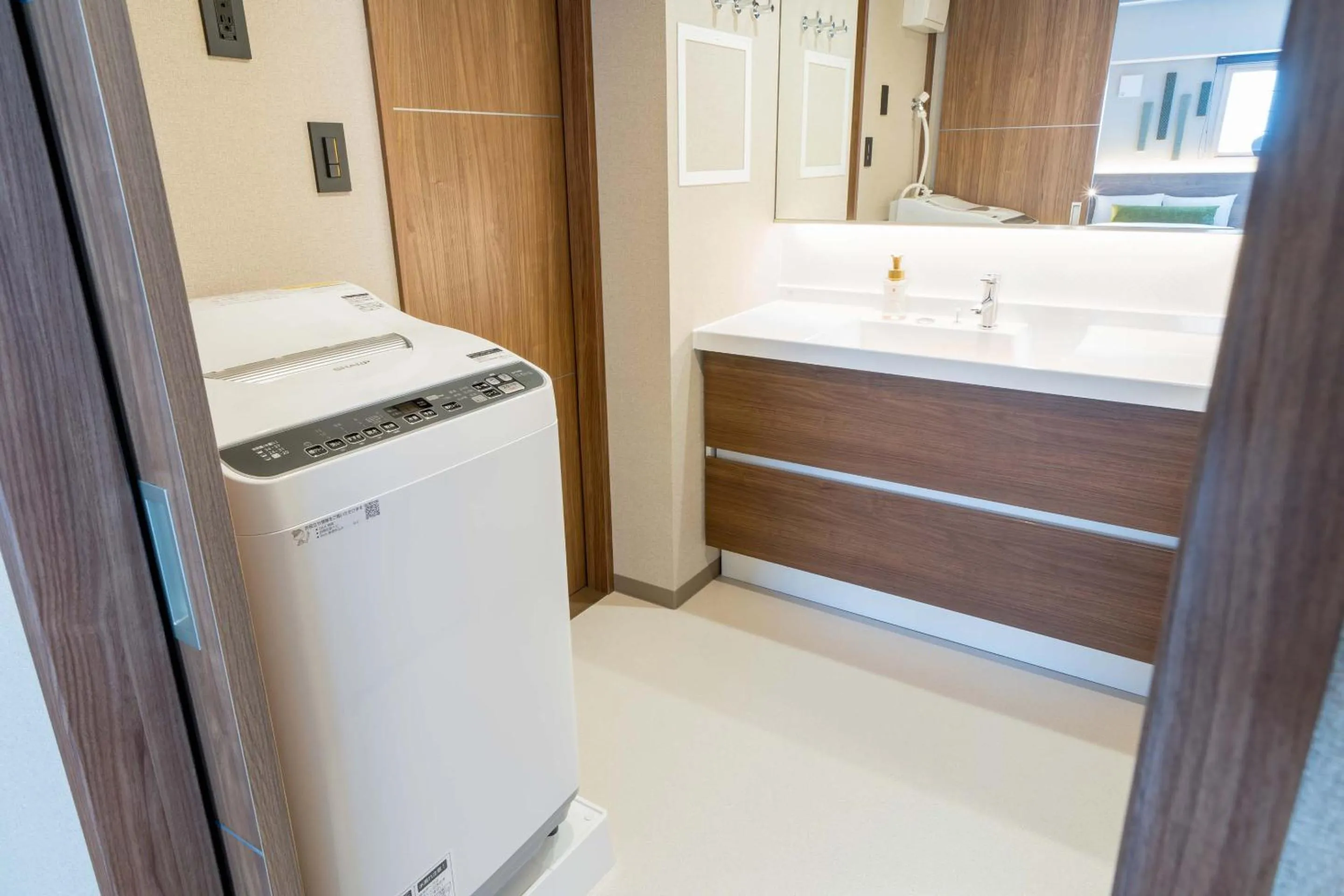 Bathroom in RESI STAY Hotel Sun Chlorella