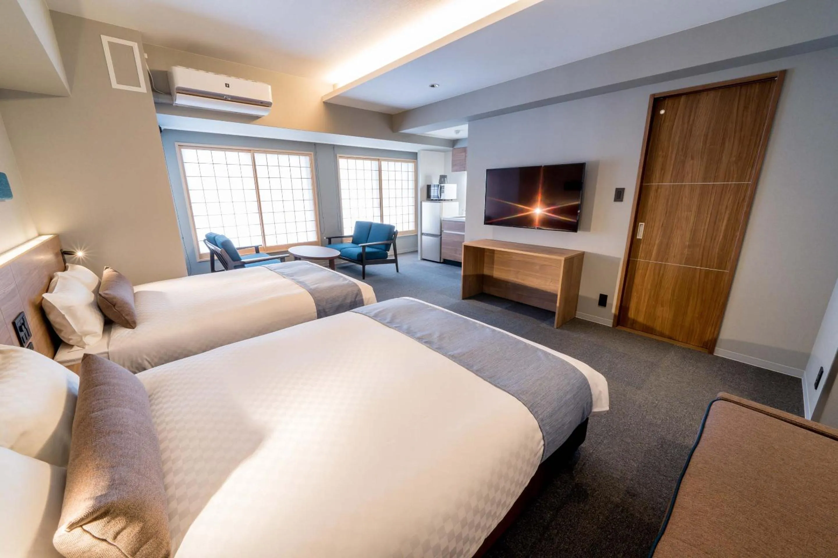 Living room, Bed in RESI STAY Hotel Sun Chlorella