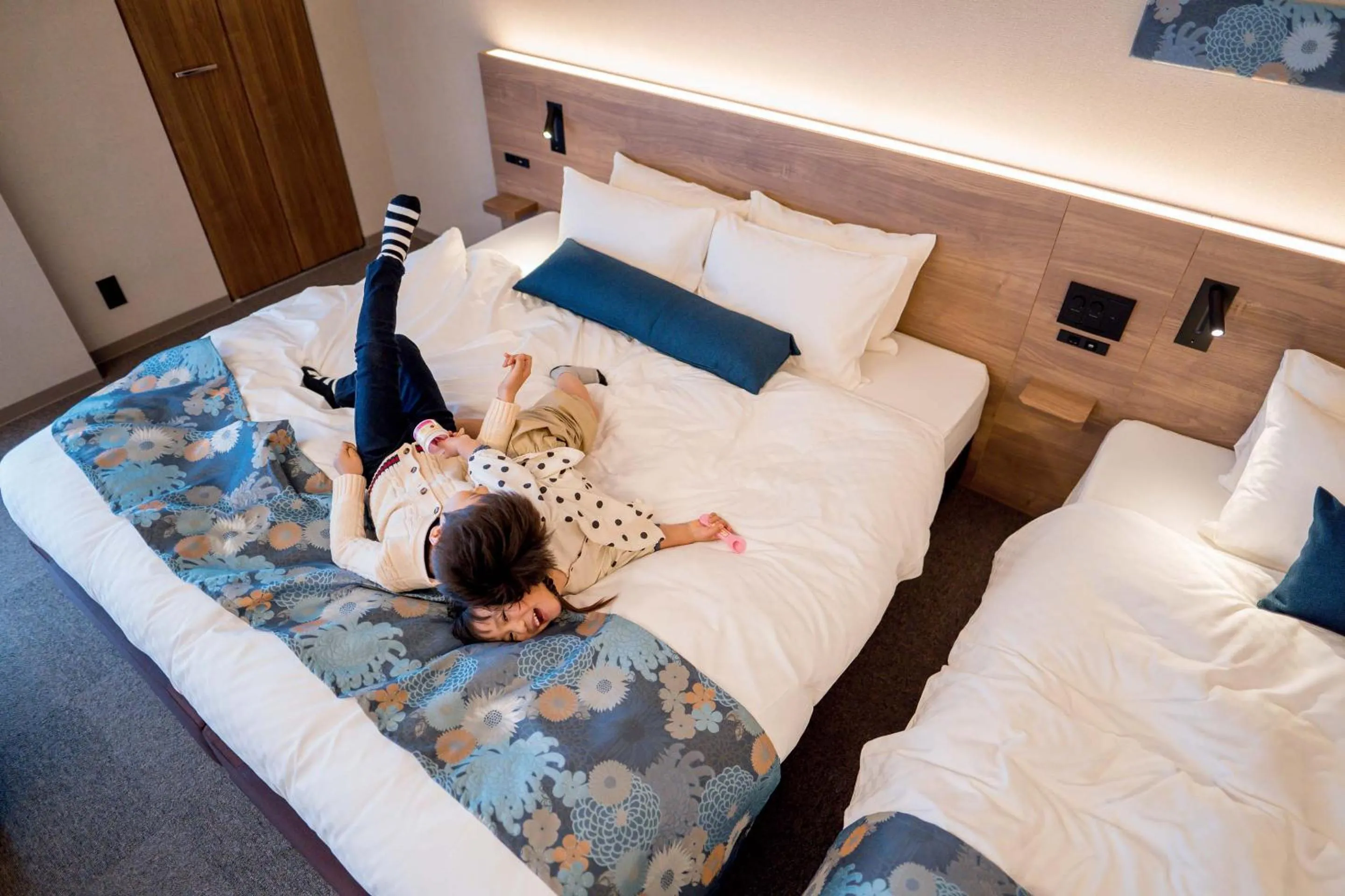 Bed in RESI STAY Hotel Sun Chlorella