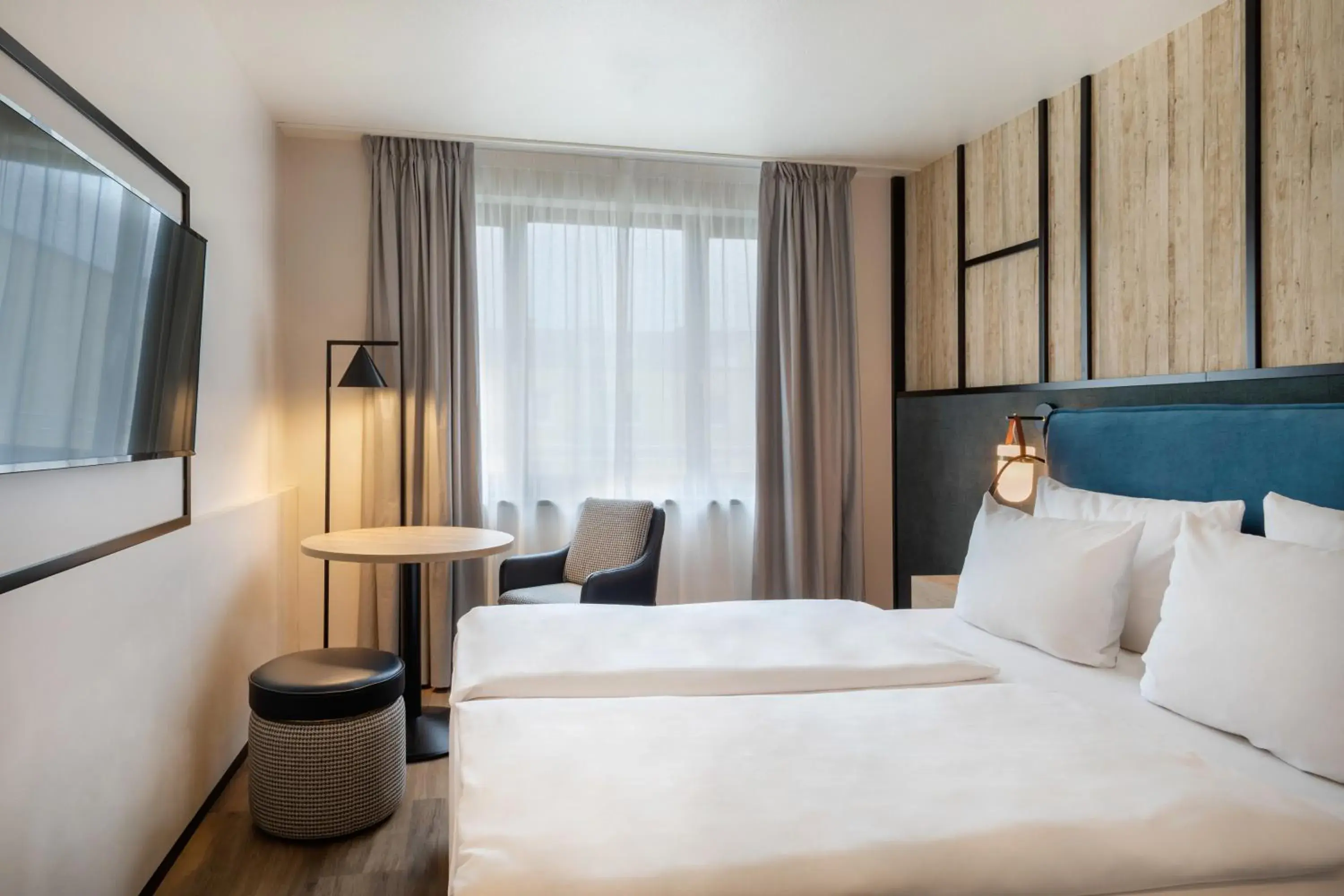 Bed in Hotel München City Center affiliated by Meliá Bed in Hotel München City Center affiliated by Meliá