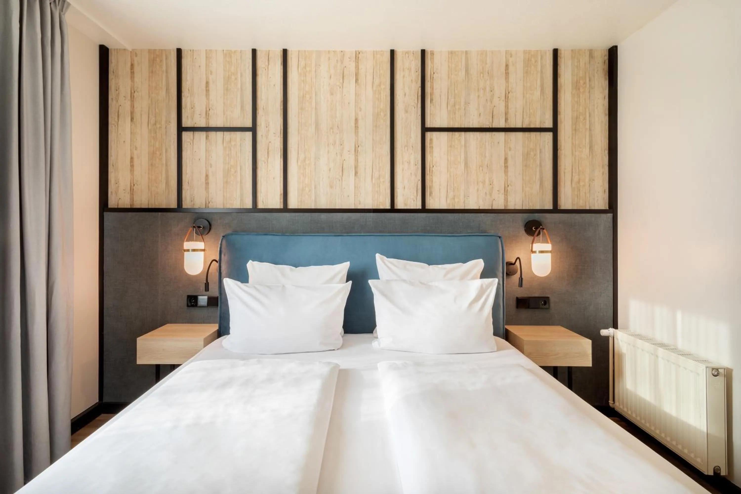 Bed in Hotel München City Center affiliated by Meliá