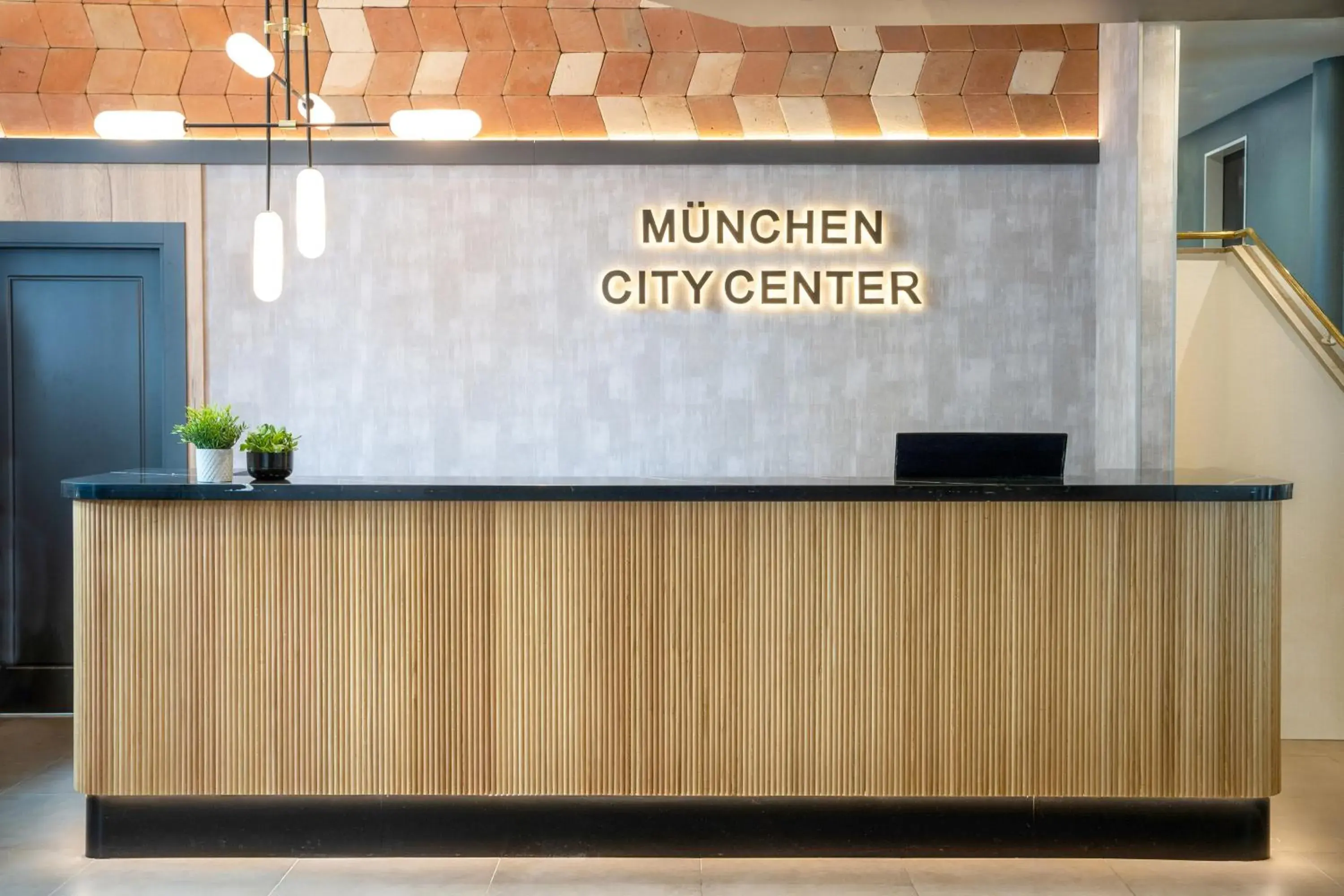 Lobby or reception in Hotel München City Center affiliated by Meliá Lobby or reception in Hotel München City Center affiliated by Meliá
