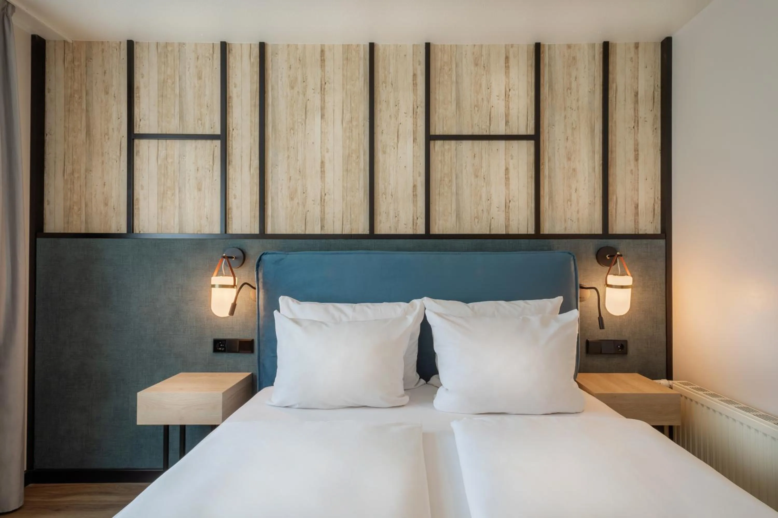 Bed in Hotel München City Center affiliated by Meliá