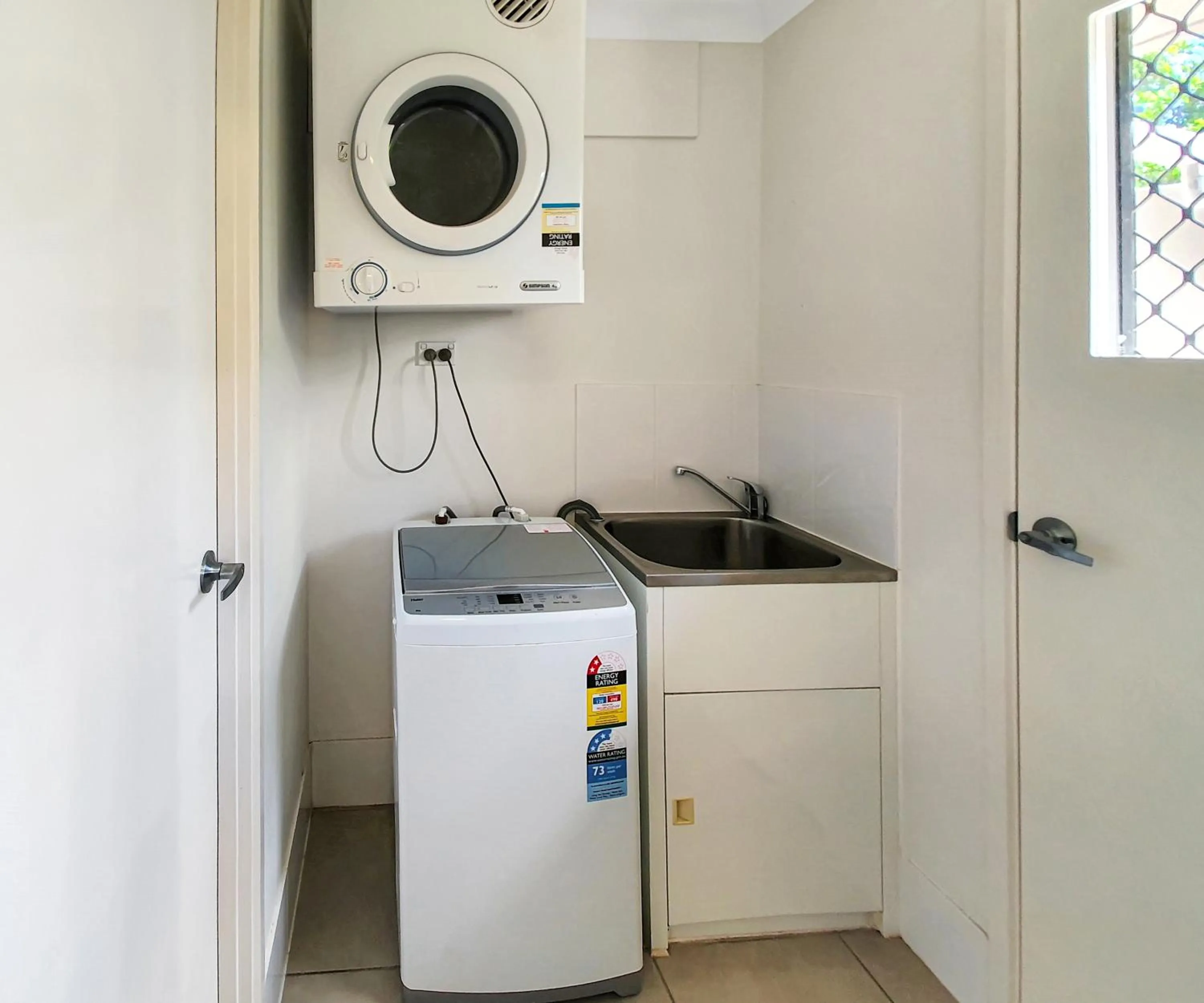 washing machine in Lillypilly Apartments