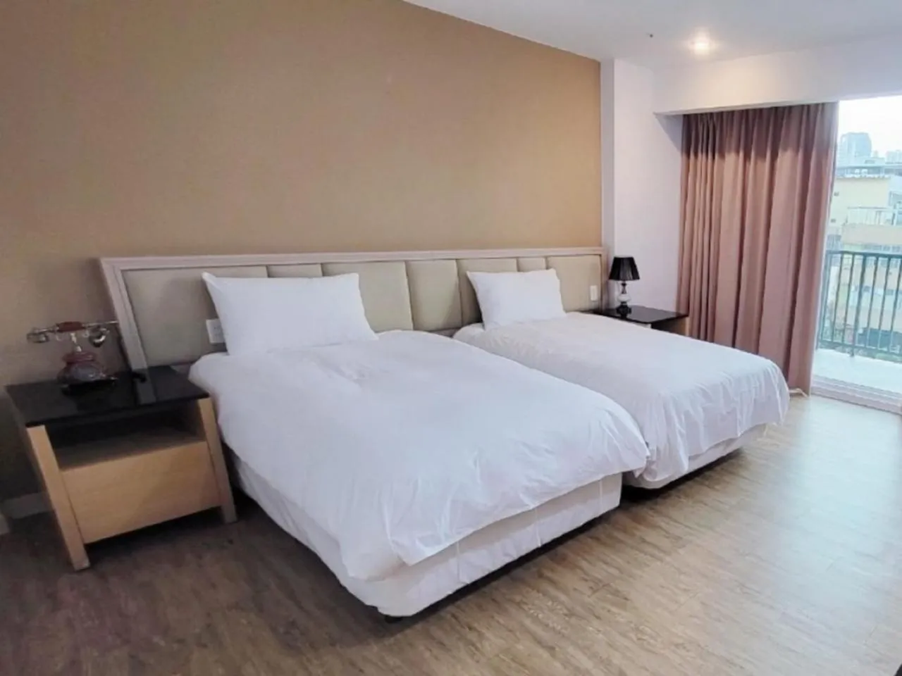Bed in Taichung EnrichLife Hotel
