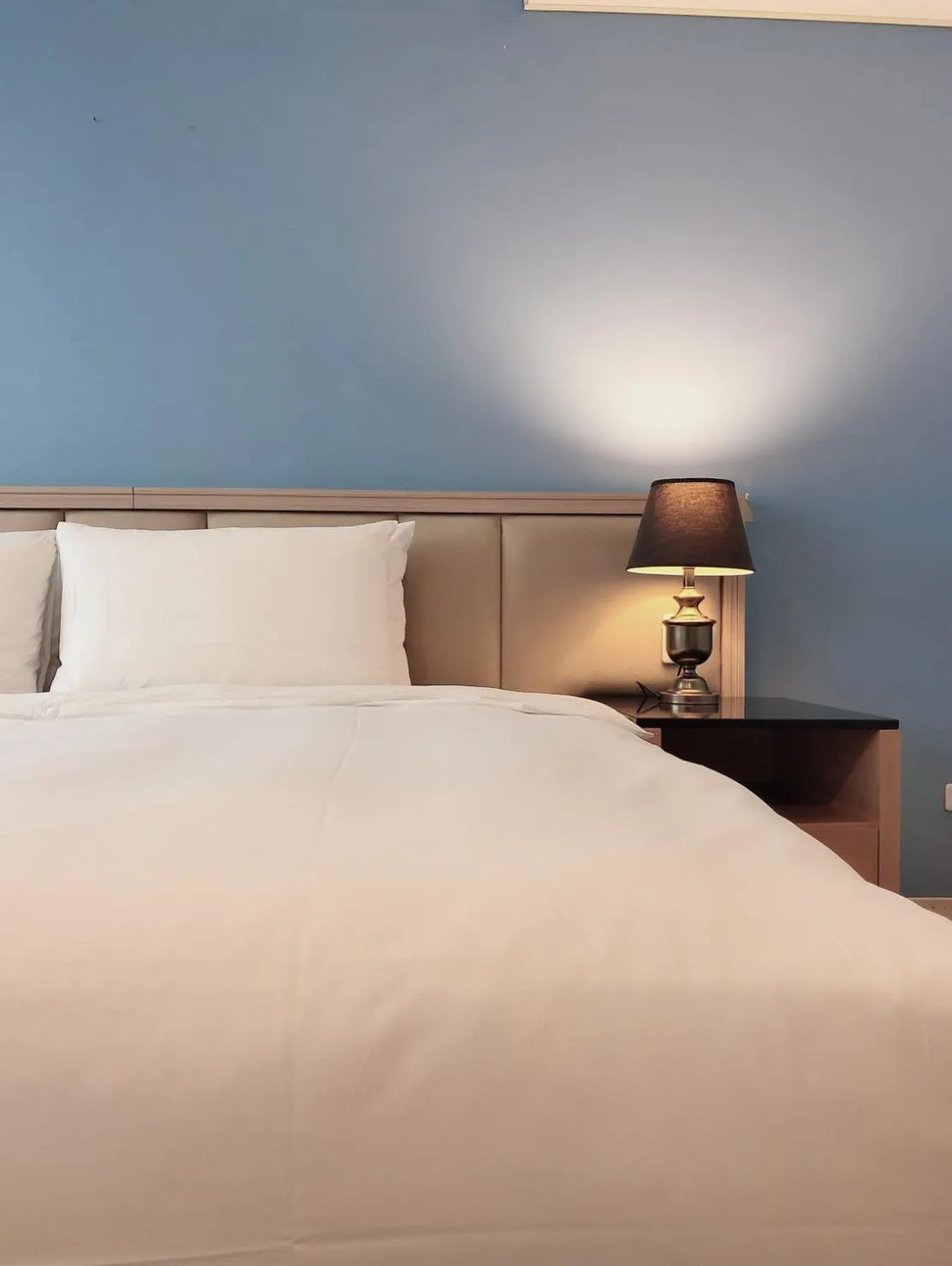 Bed in Taichung EnrichLife Hotel