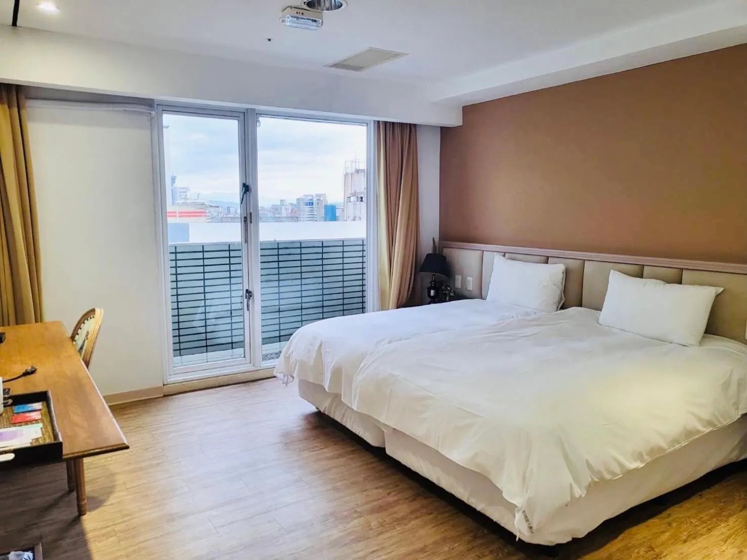 Bed in Taichung EnrichLife Hotel