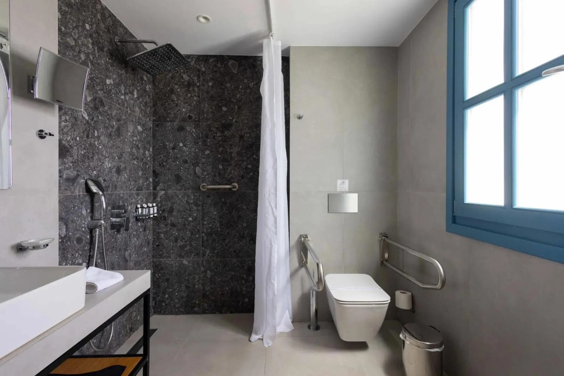 Shower in Aeifos Boutique Hotel