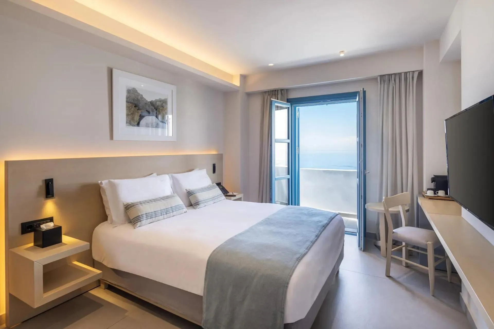 Bed in Aeifos Boutique Hotel